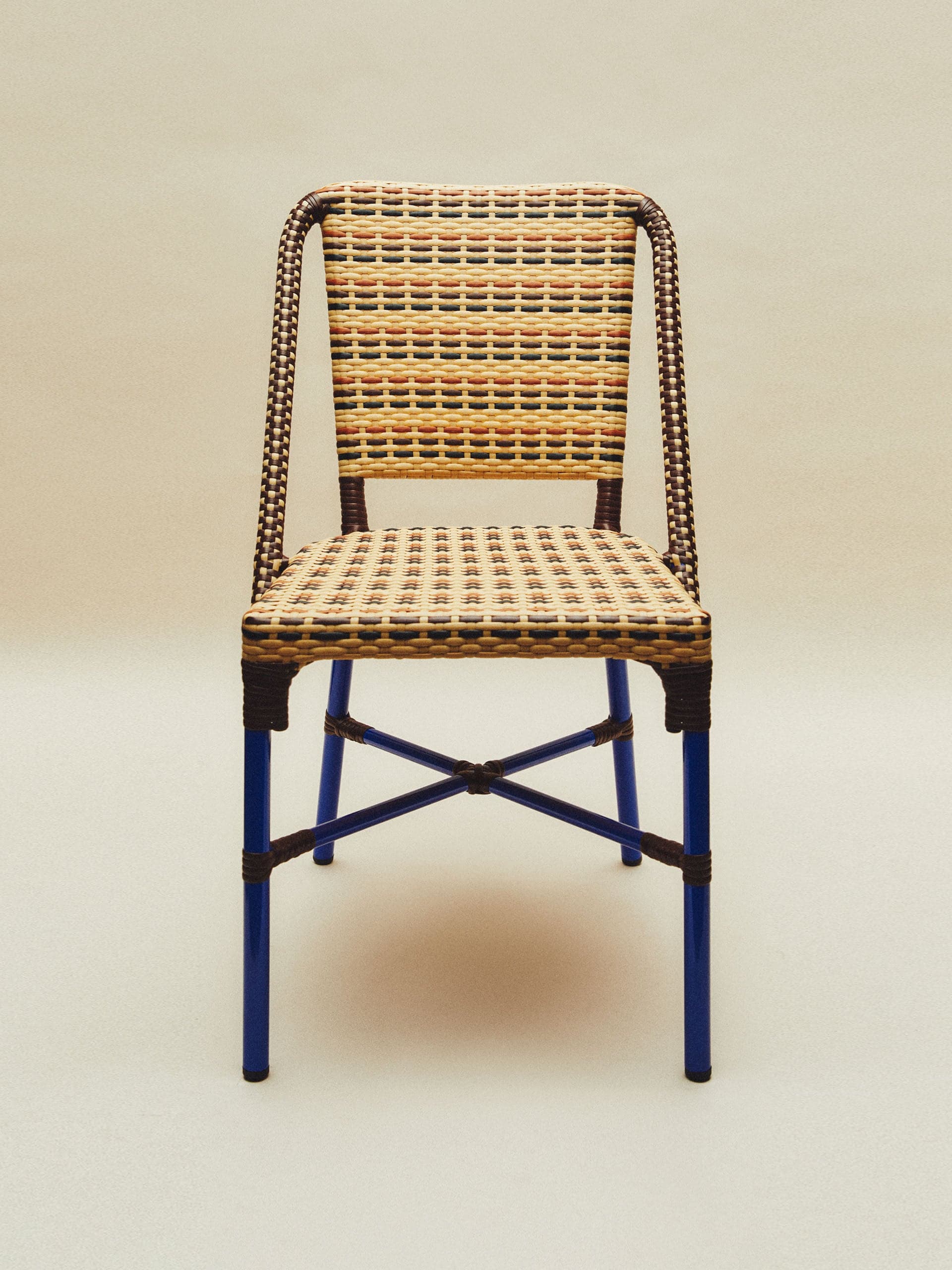 Woven chair with metal structure