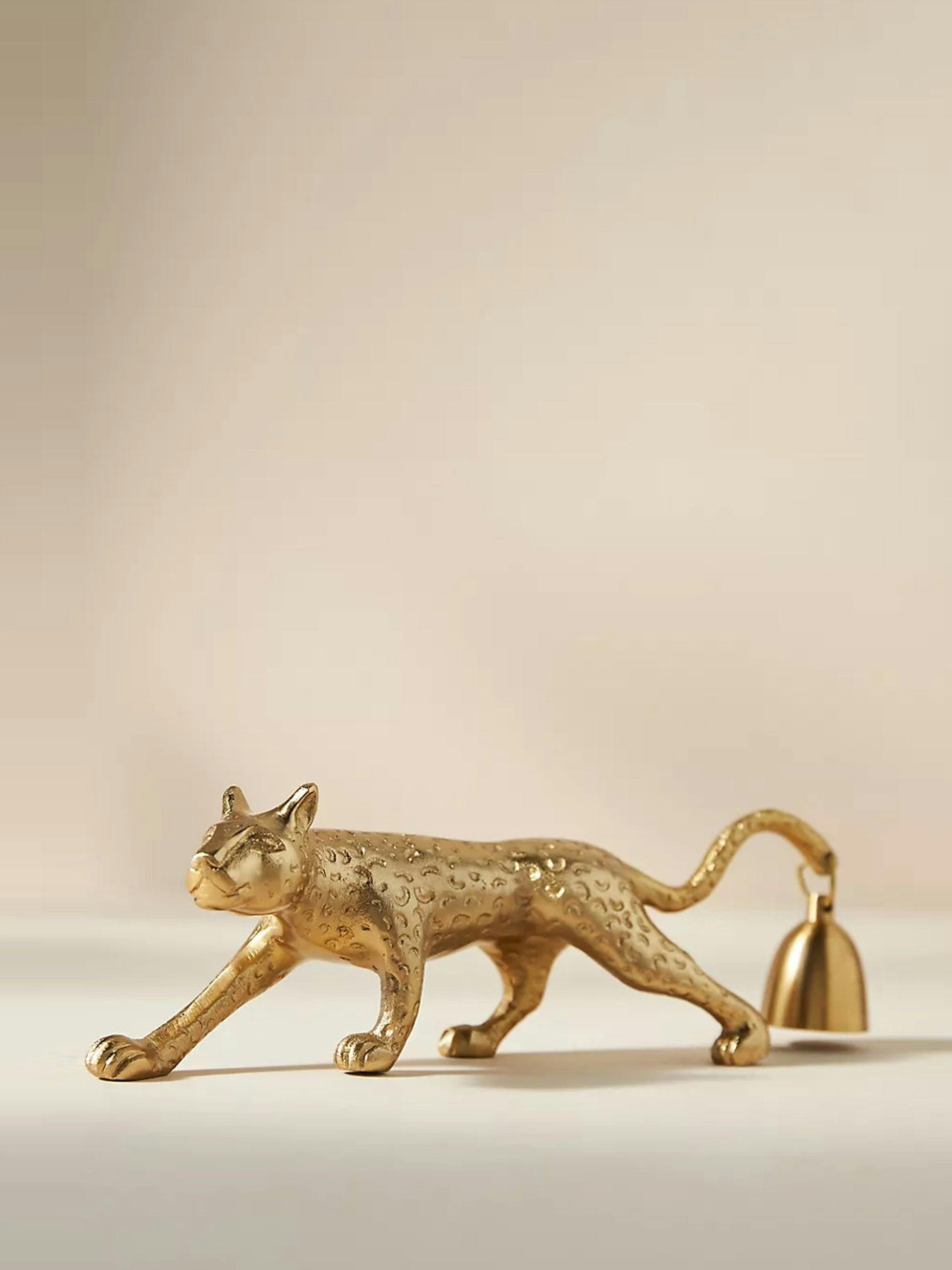 Metal leopard candle snuffer