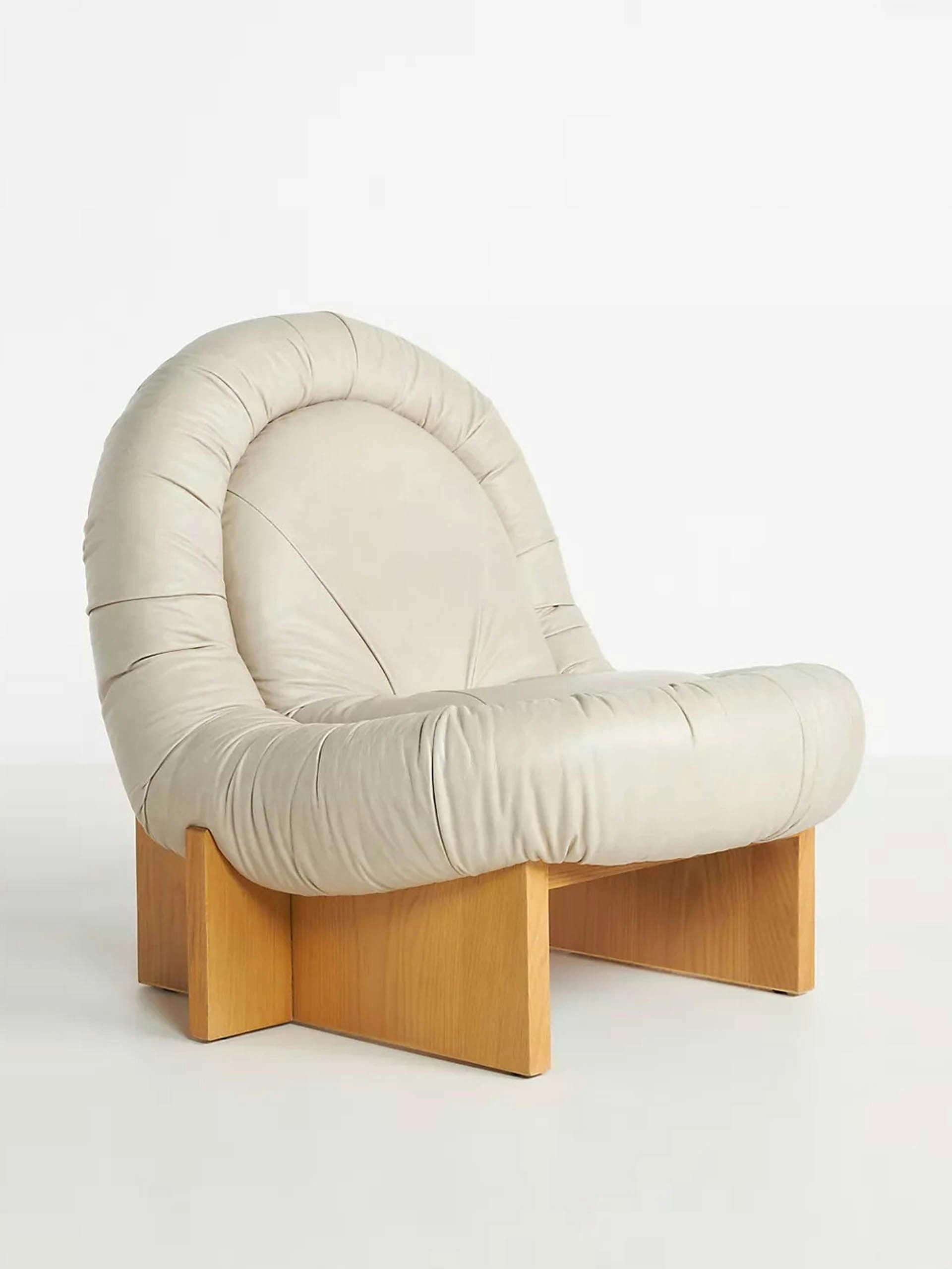 Taupe leather armless armchair