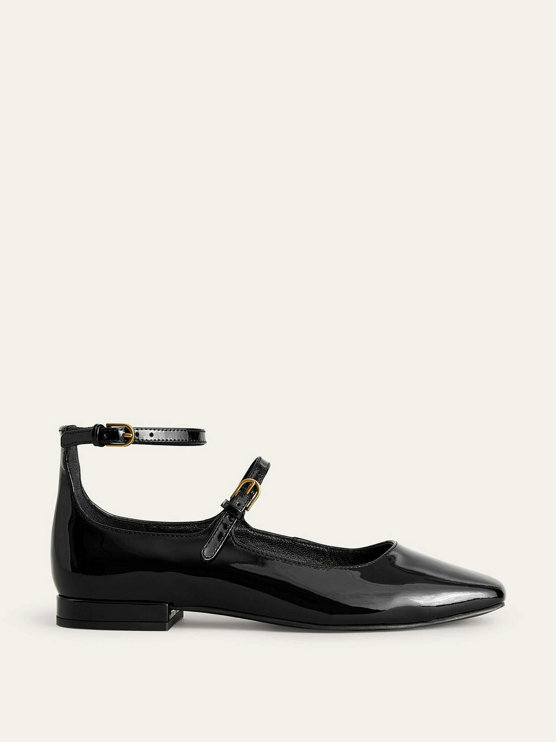 Black patent double strap Mary Jane shoes