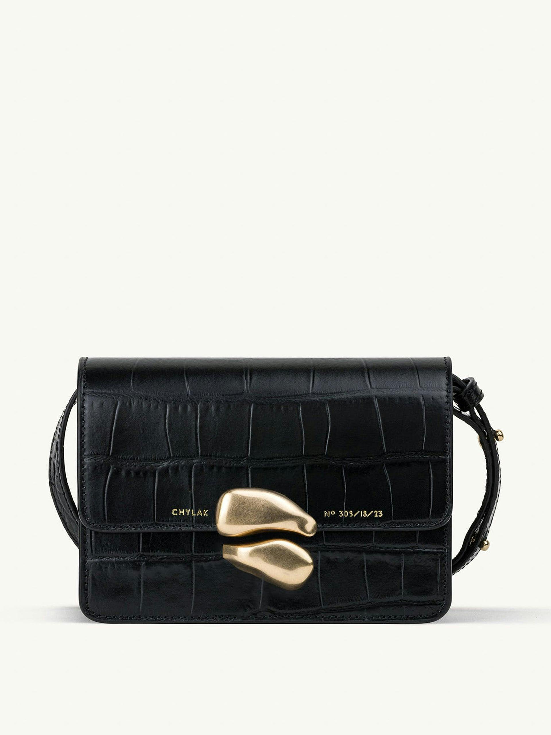 Black mini leather bag with gold sculptural seal