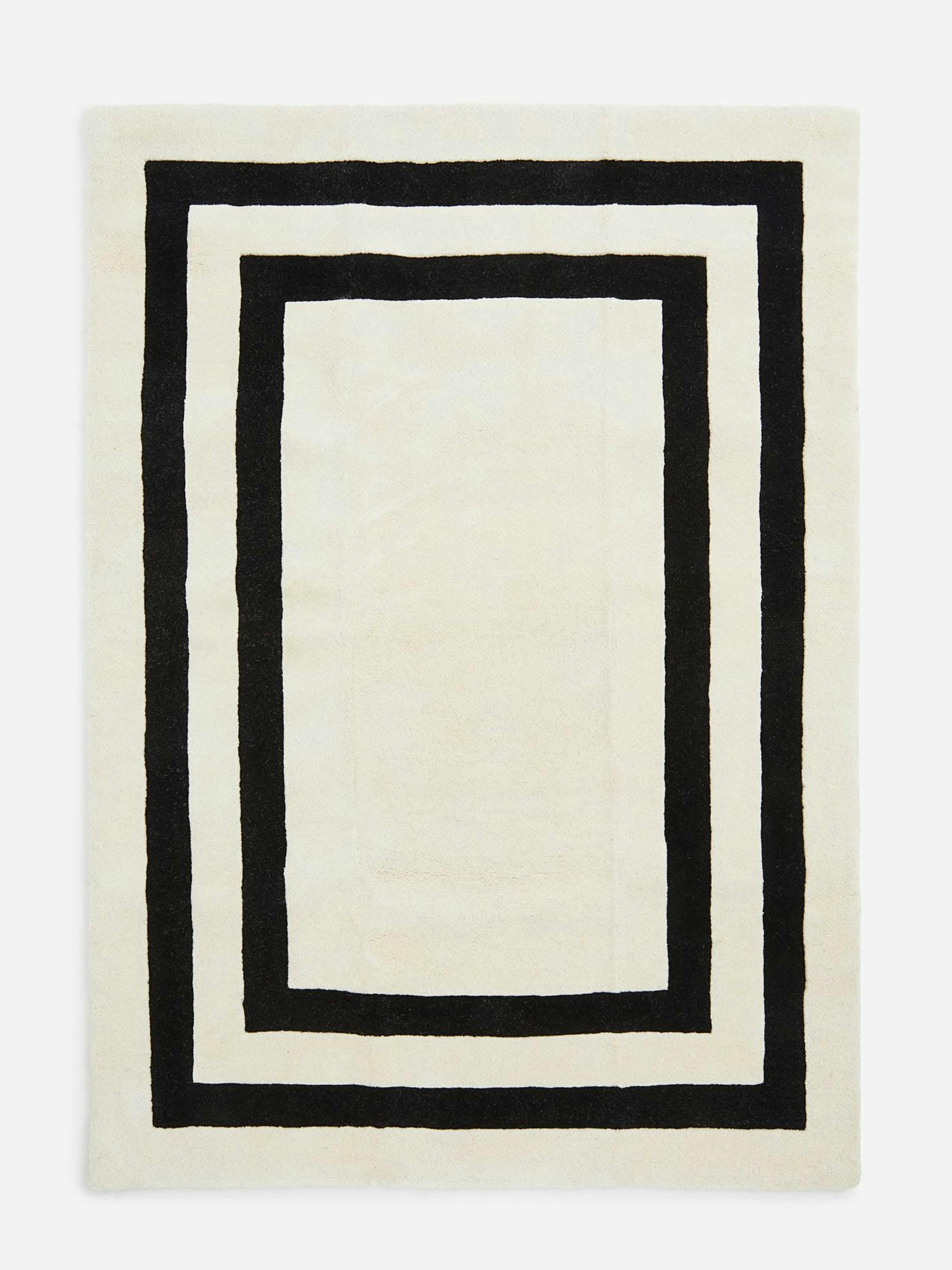 White patterned wool rug