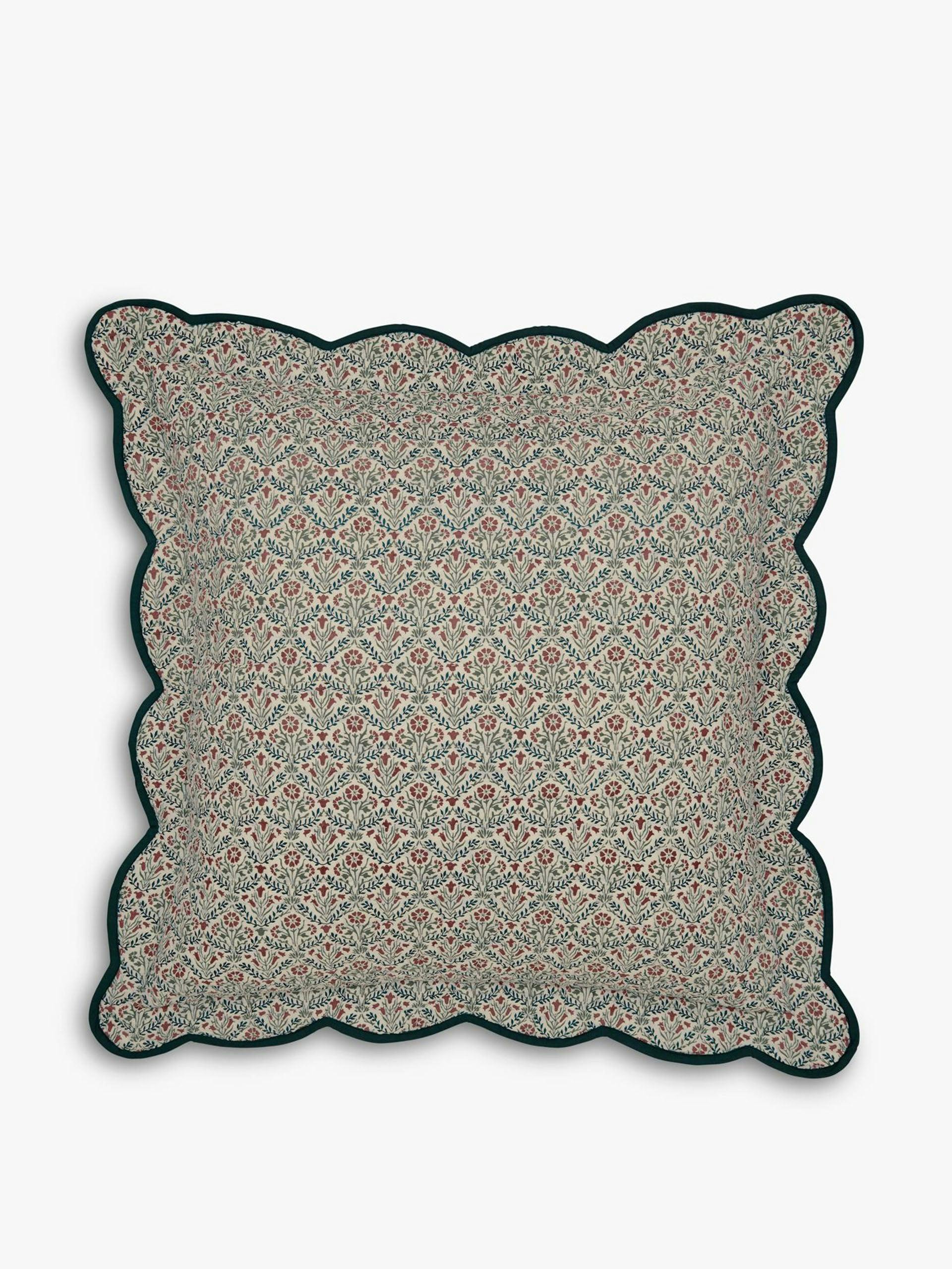 Scallop embroidered quilted cushion