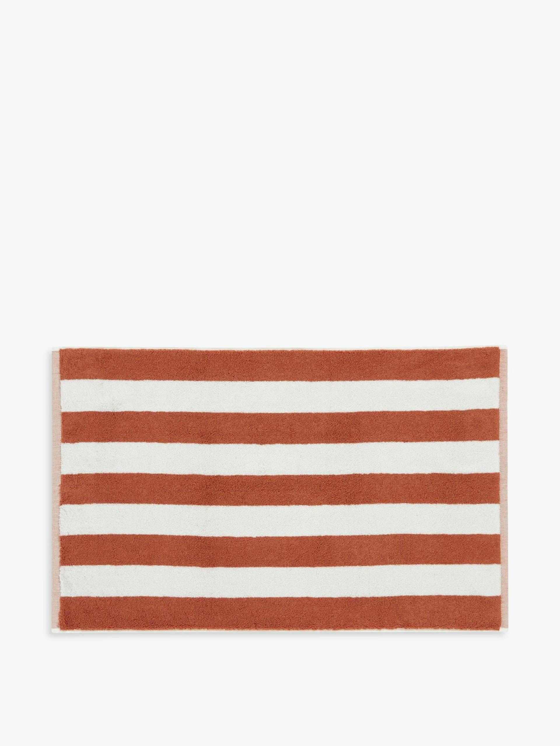 Burnt orange striped terry bath mat