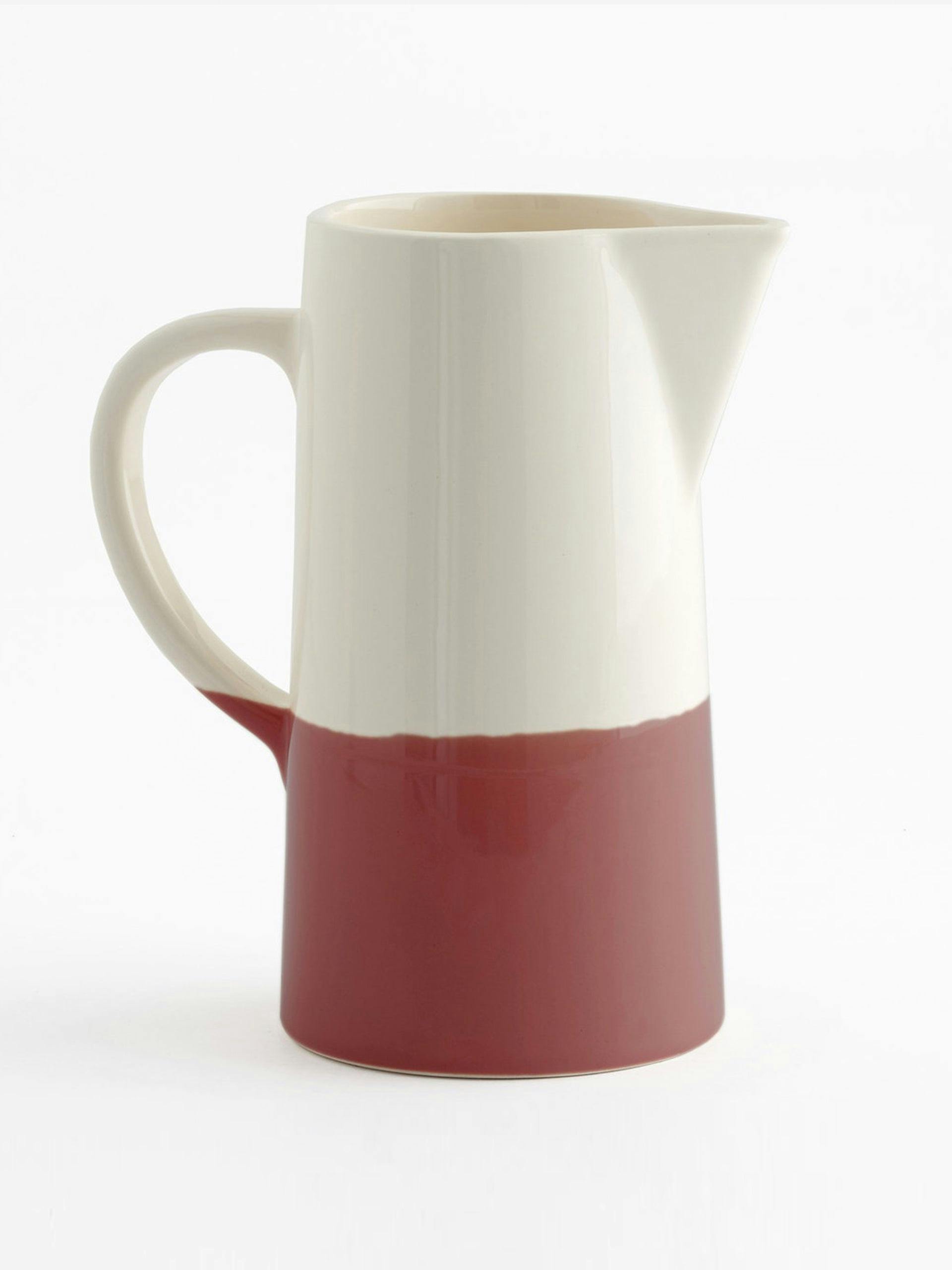 Red and white ceramic jug