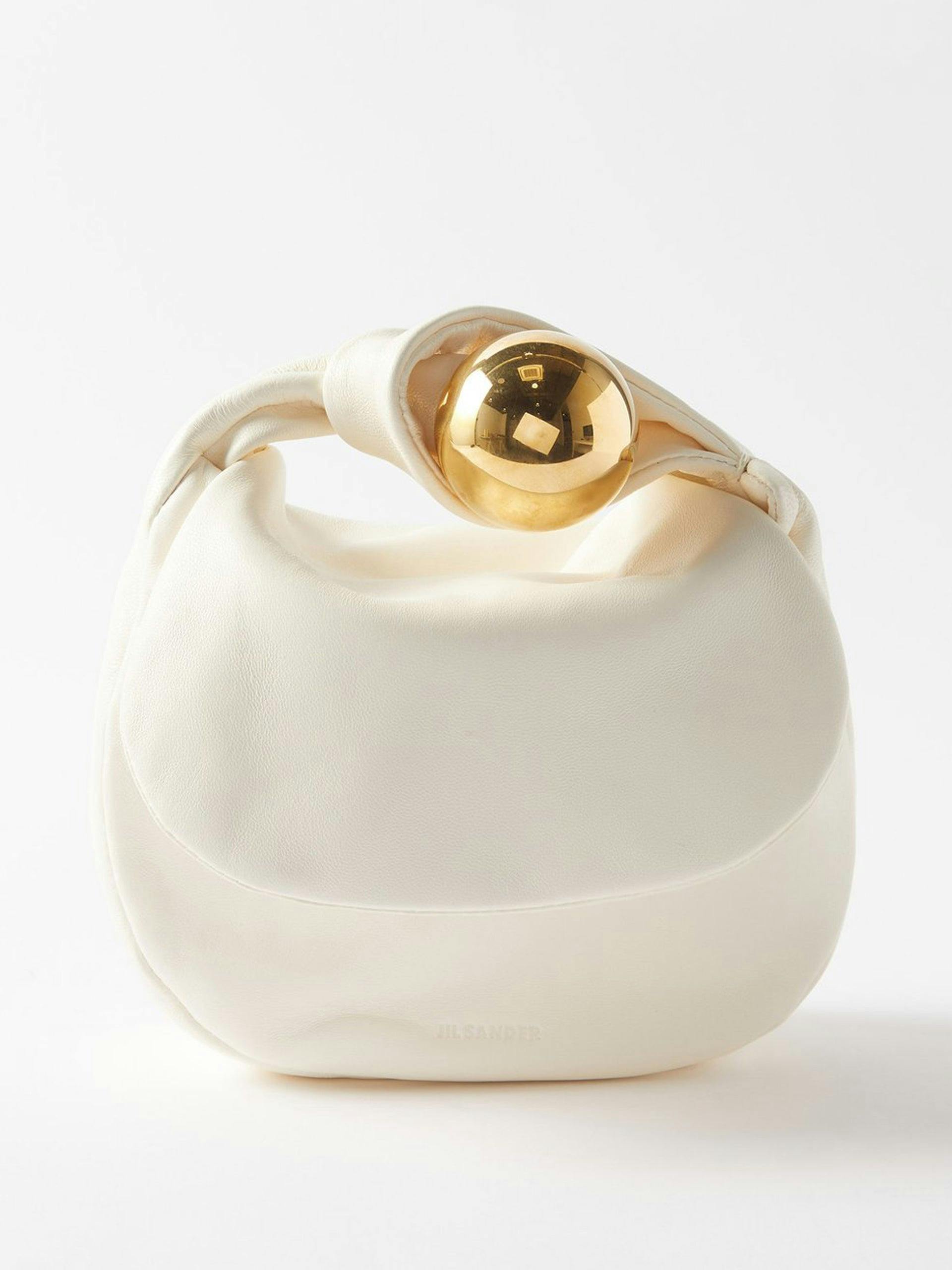 Sphere handle leather clutch bag in cream