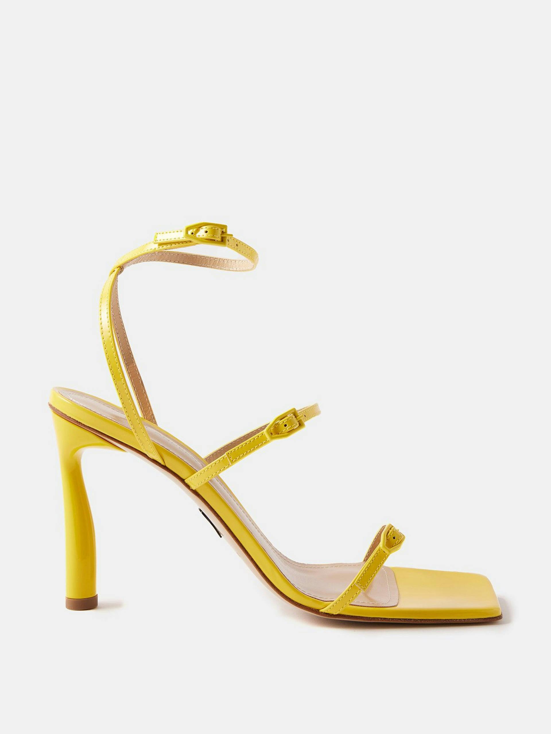 Yellow slinky patent-leather sandals