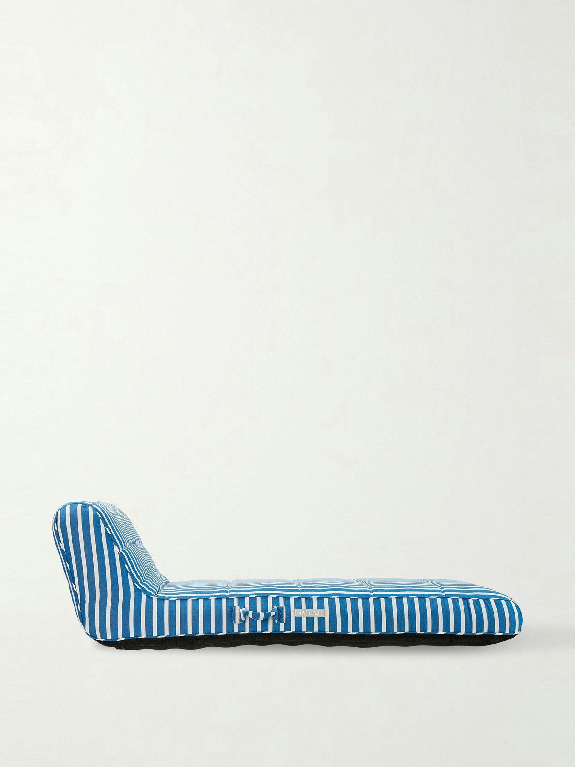 Striped upholstered pool lounger