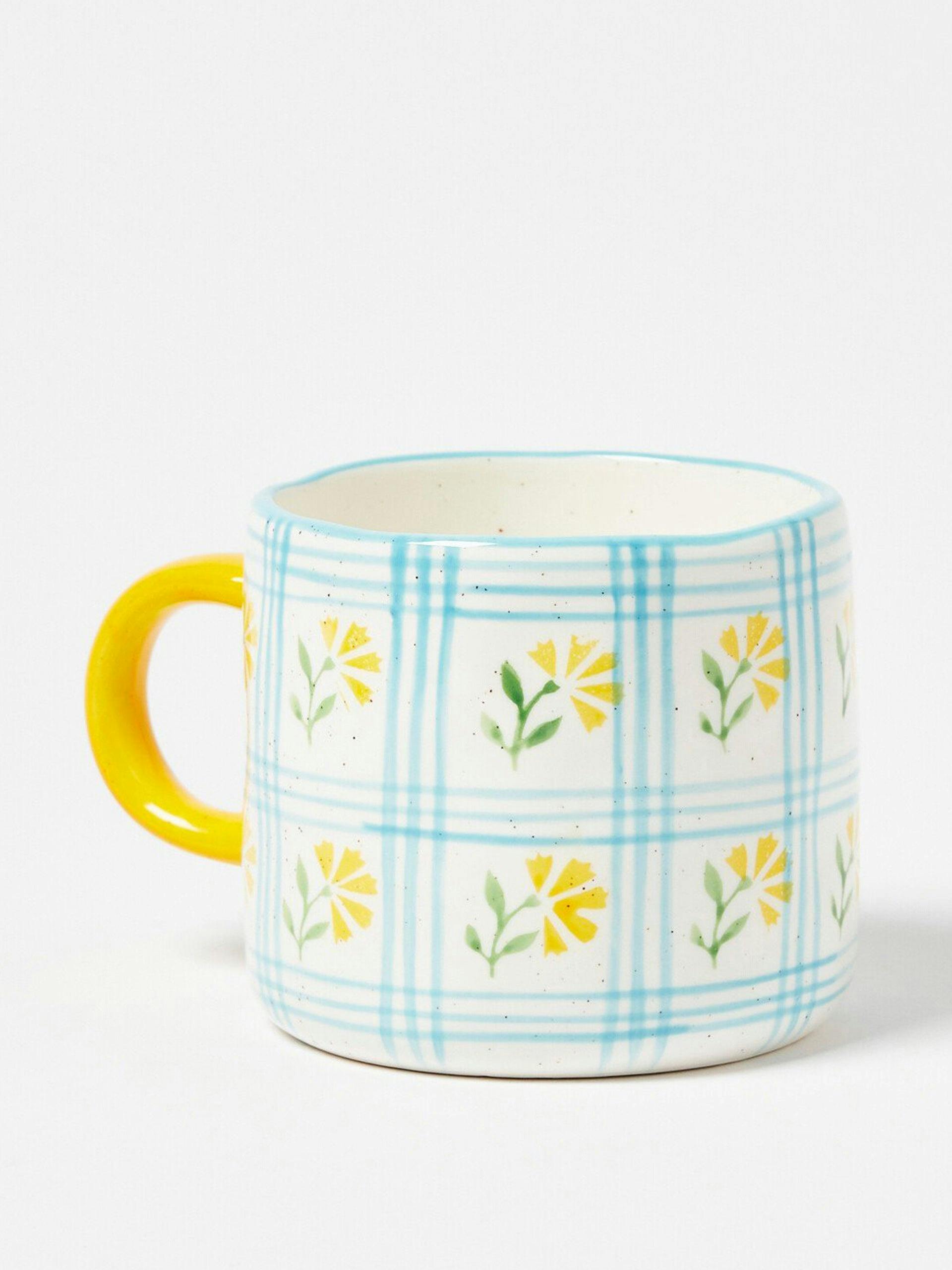 Blue and yellow floral print ceramic mug