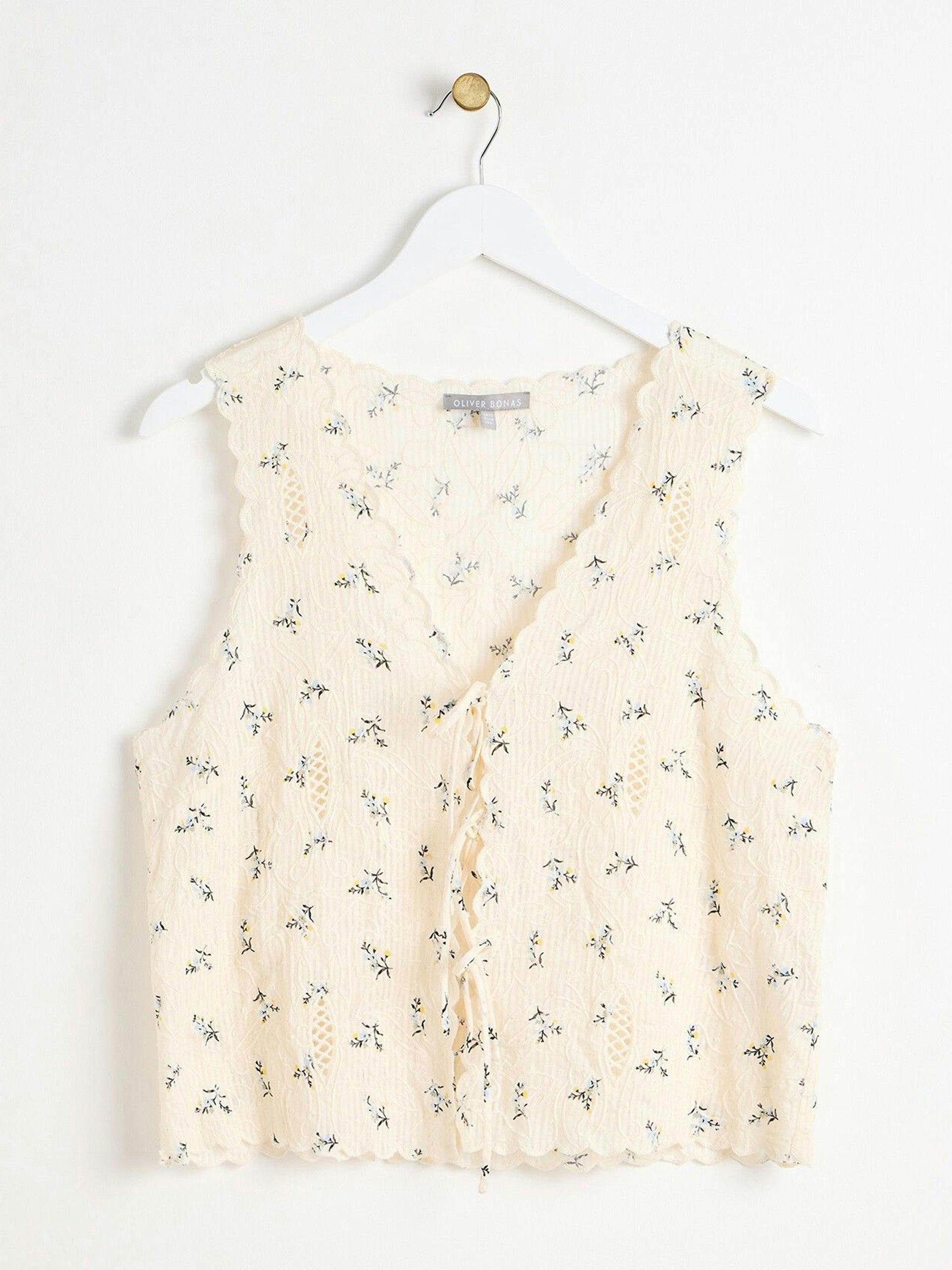 Embroidered floral white shell top