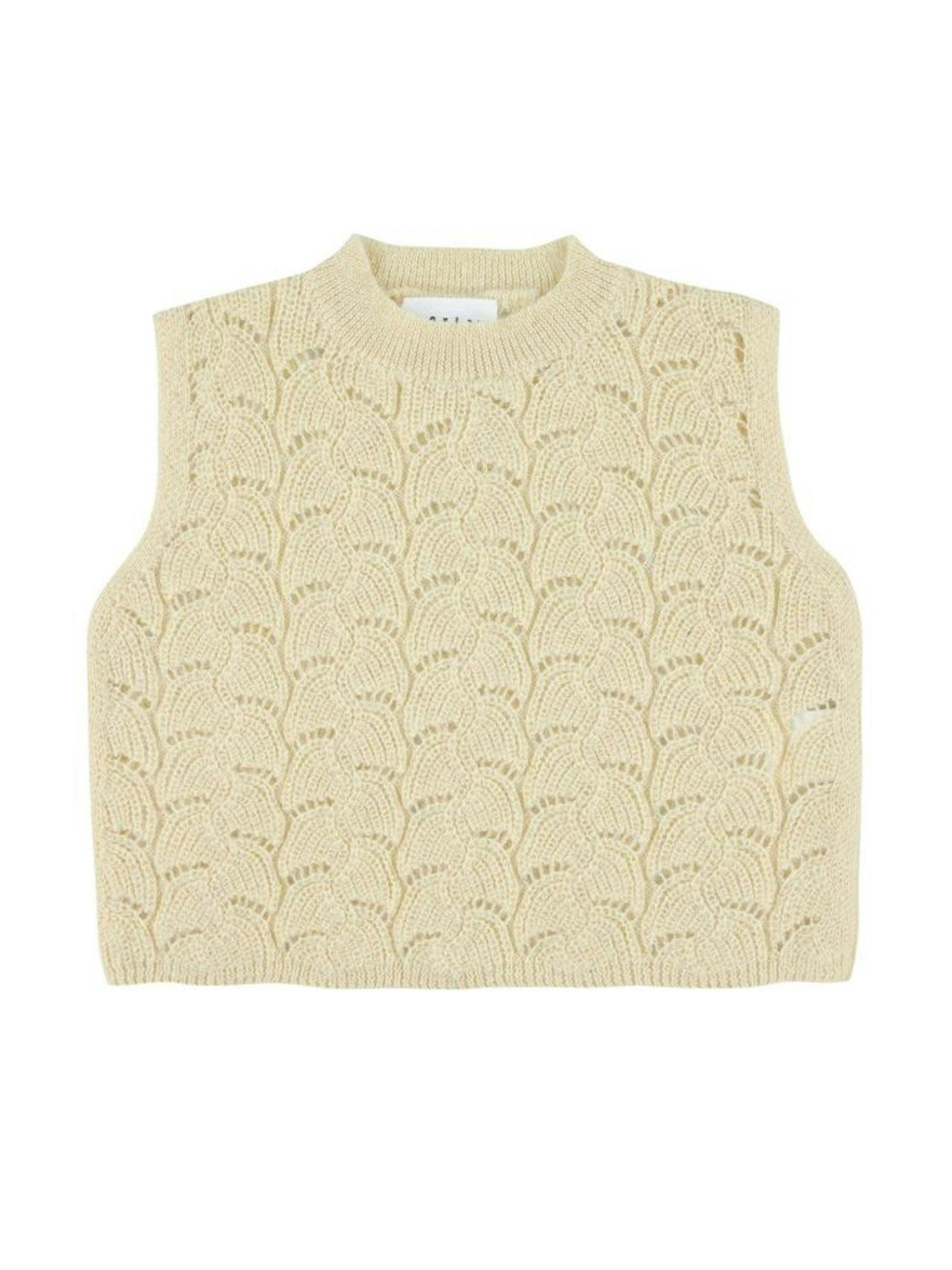 Cream sleeveless knit top