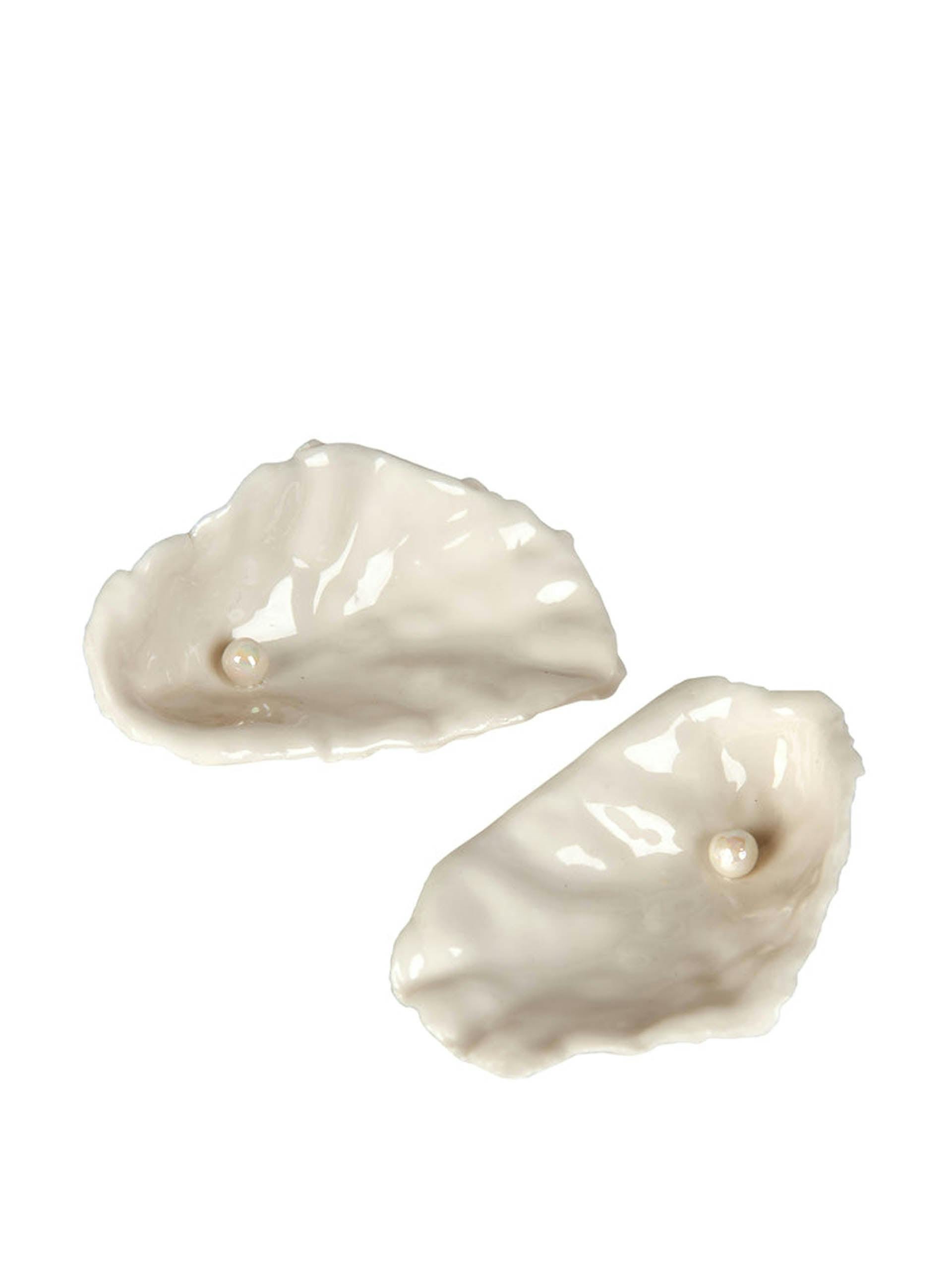 Pair of oyster salt and pepper cellars
