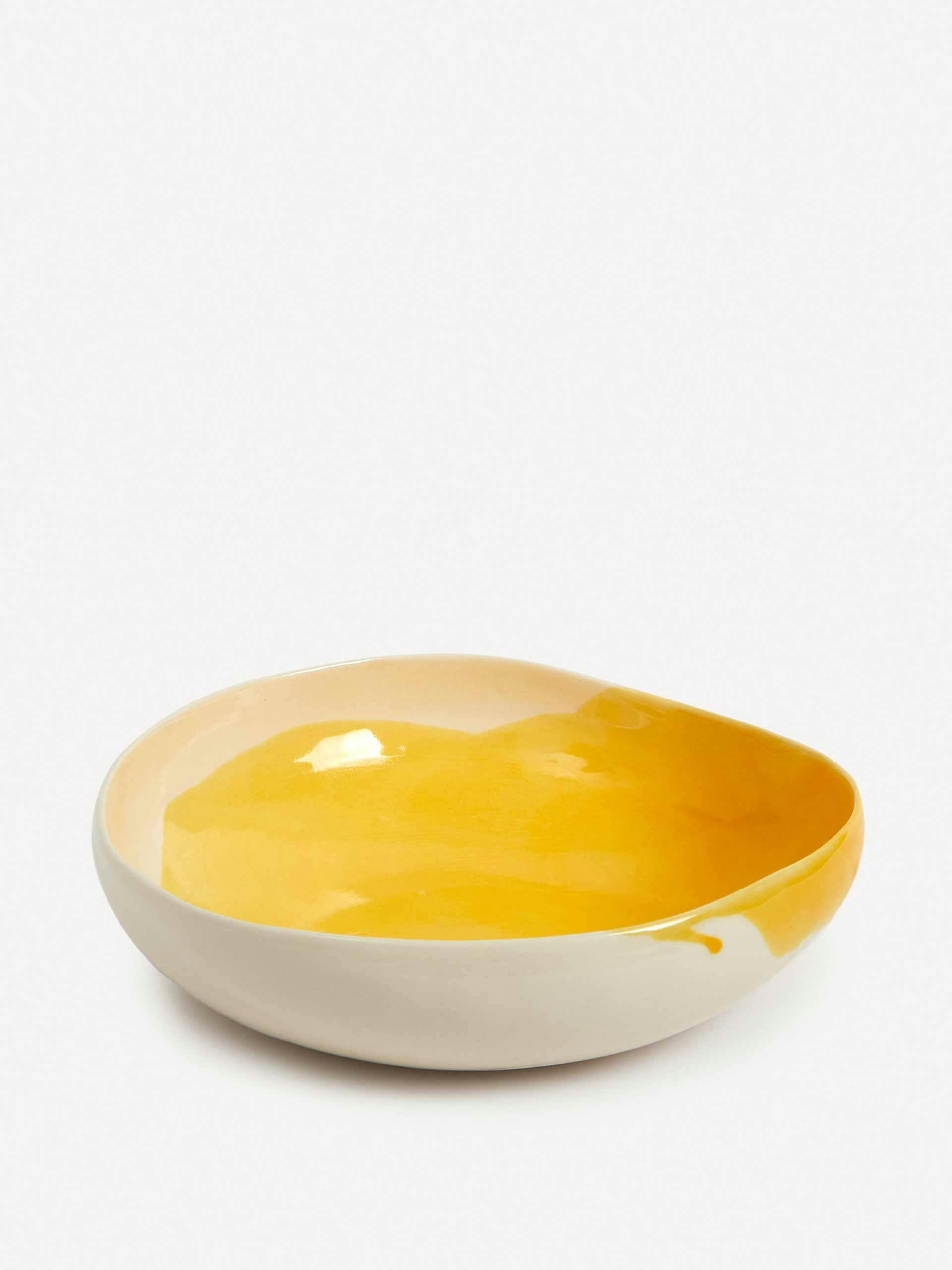 Yellow painted porcelain bowl