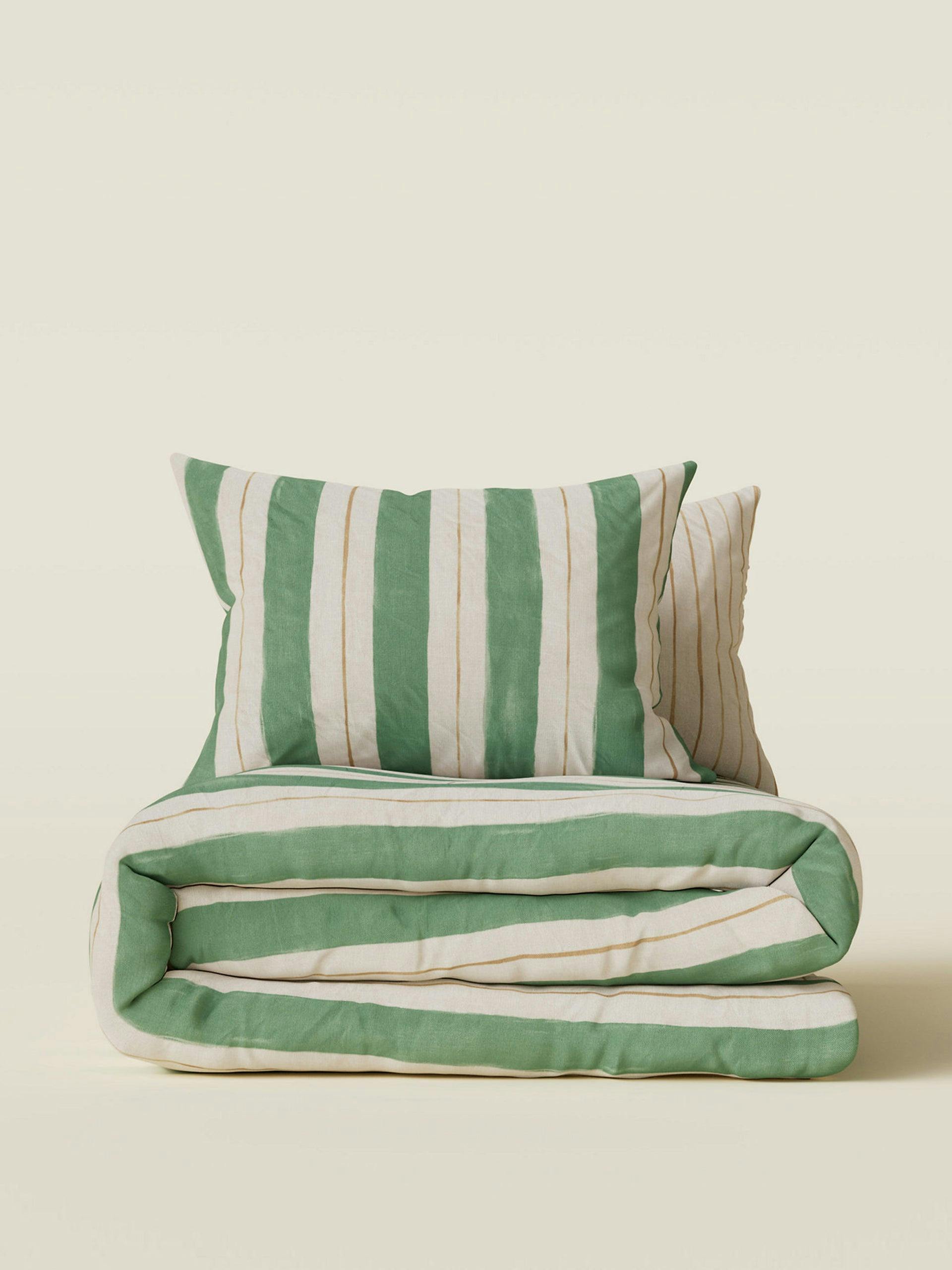 Watercolour green stripe bed linen
