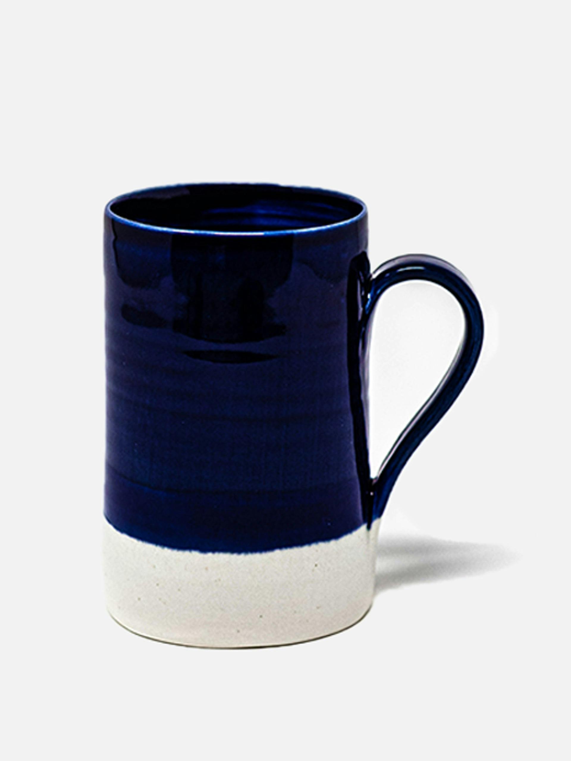 Hand-thrown glazed ceramic mug