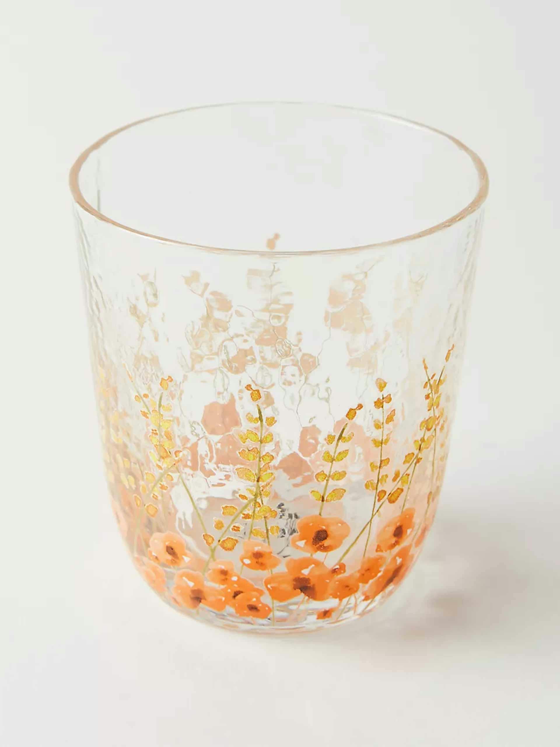 Orange floral juice glass