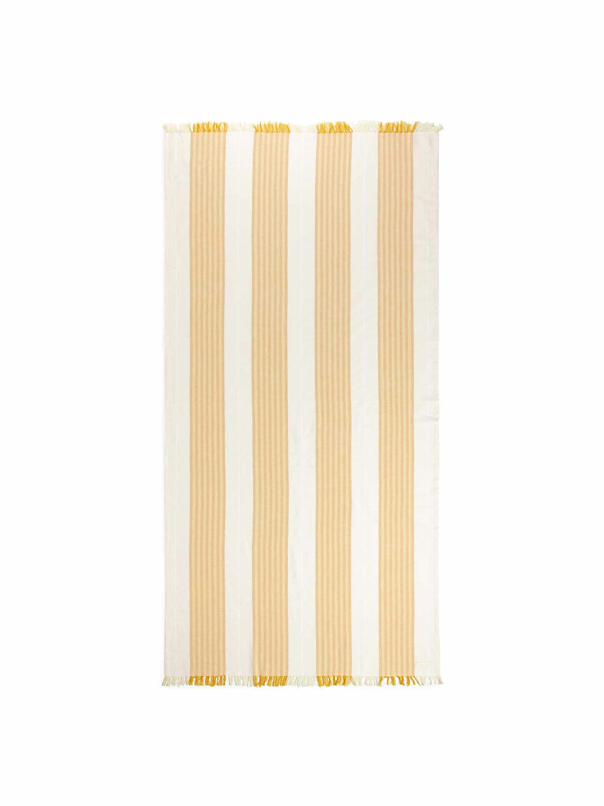 Yellow and white striped beach blanket