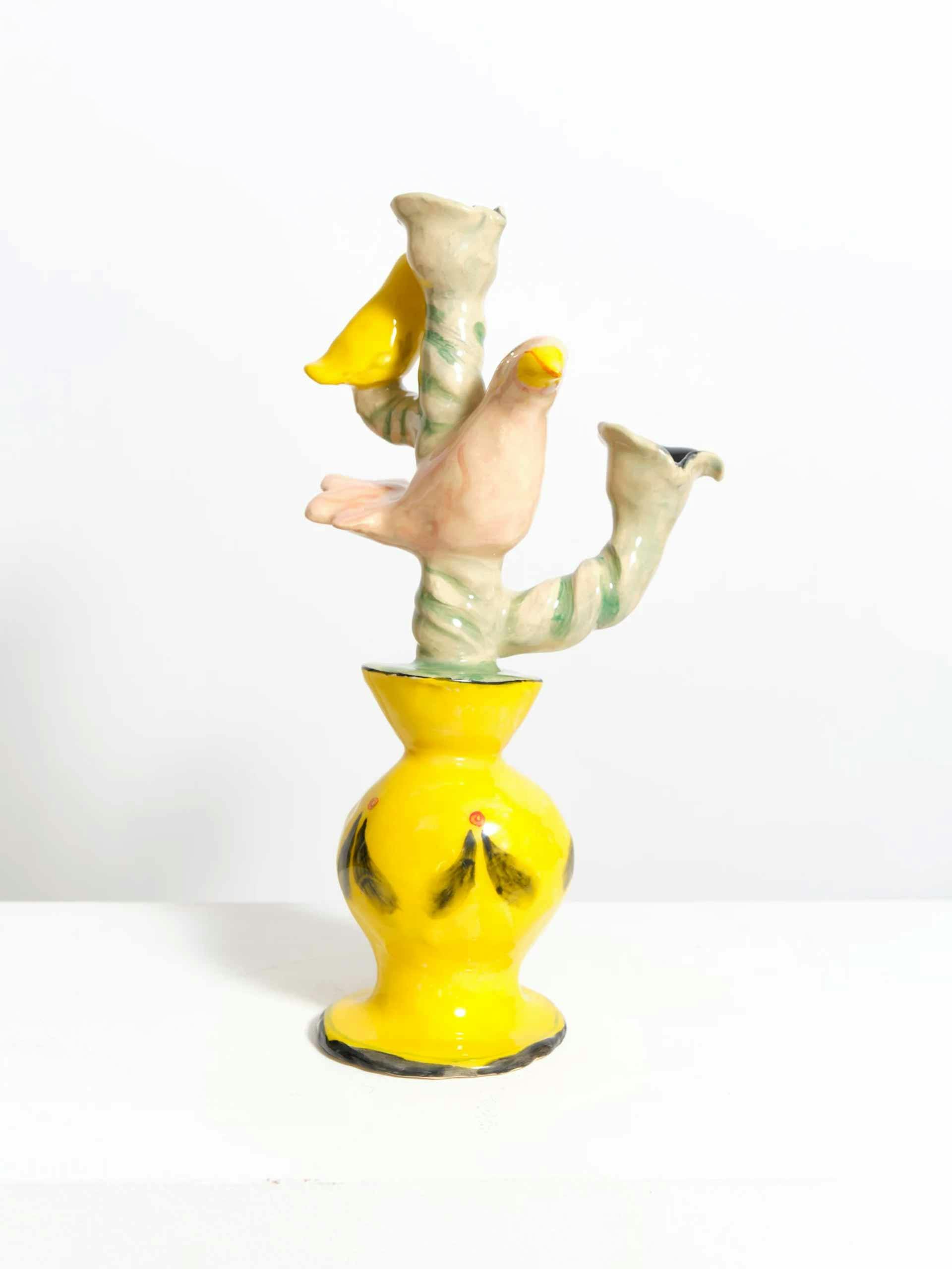 Pair of pink and yellow bird candleholders