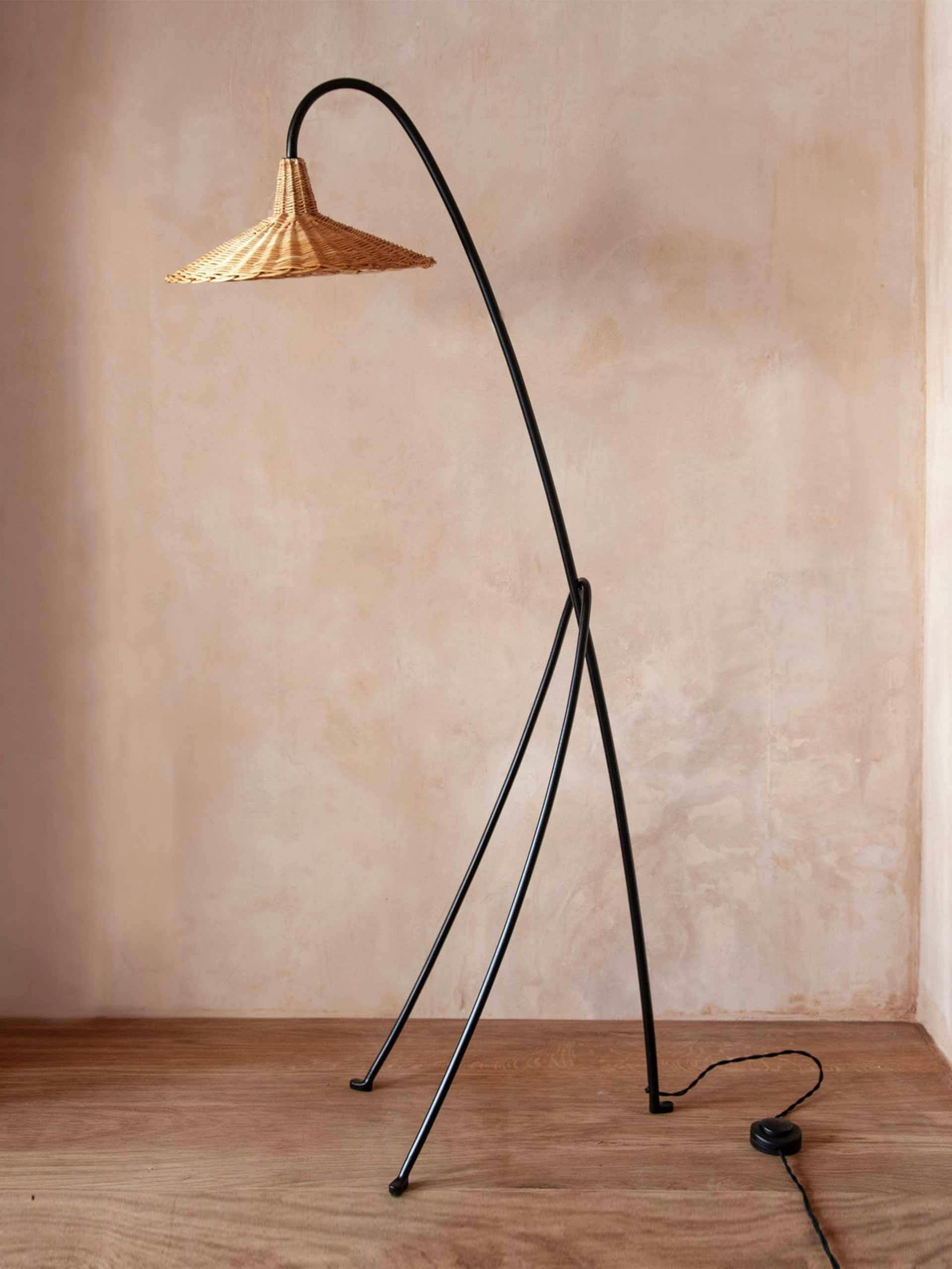 Floor lamp with wicker shade