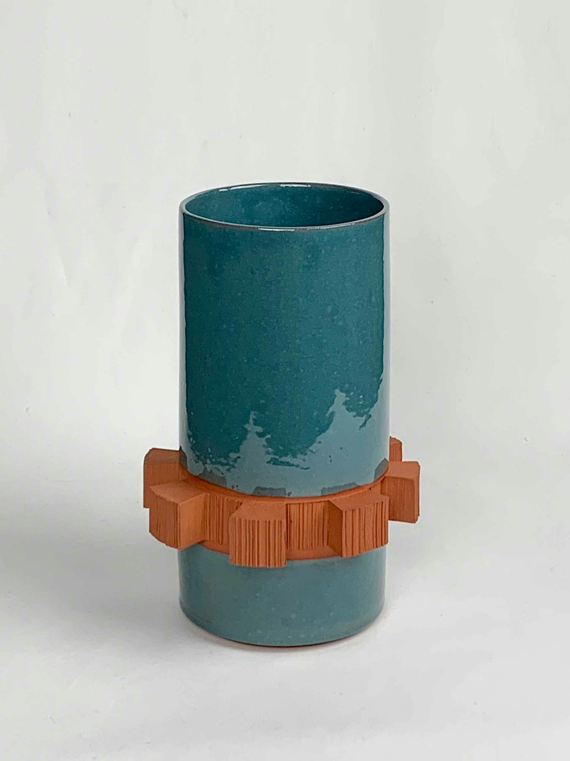 Textured terracotta vase.