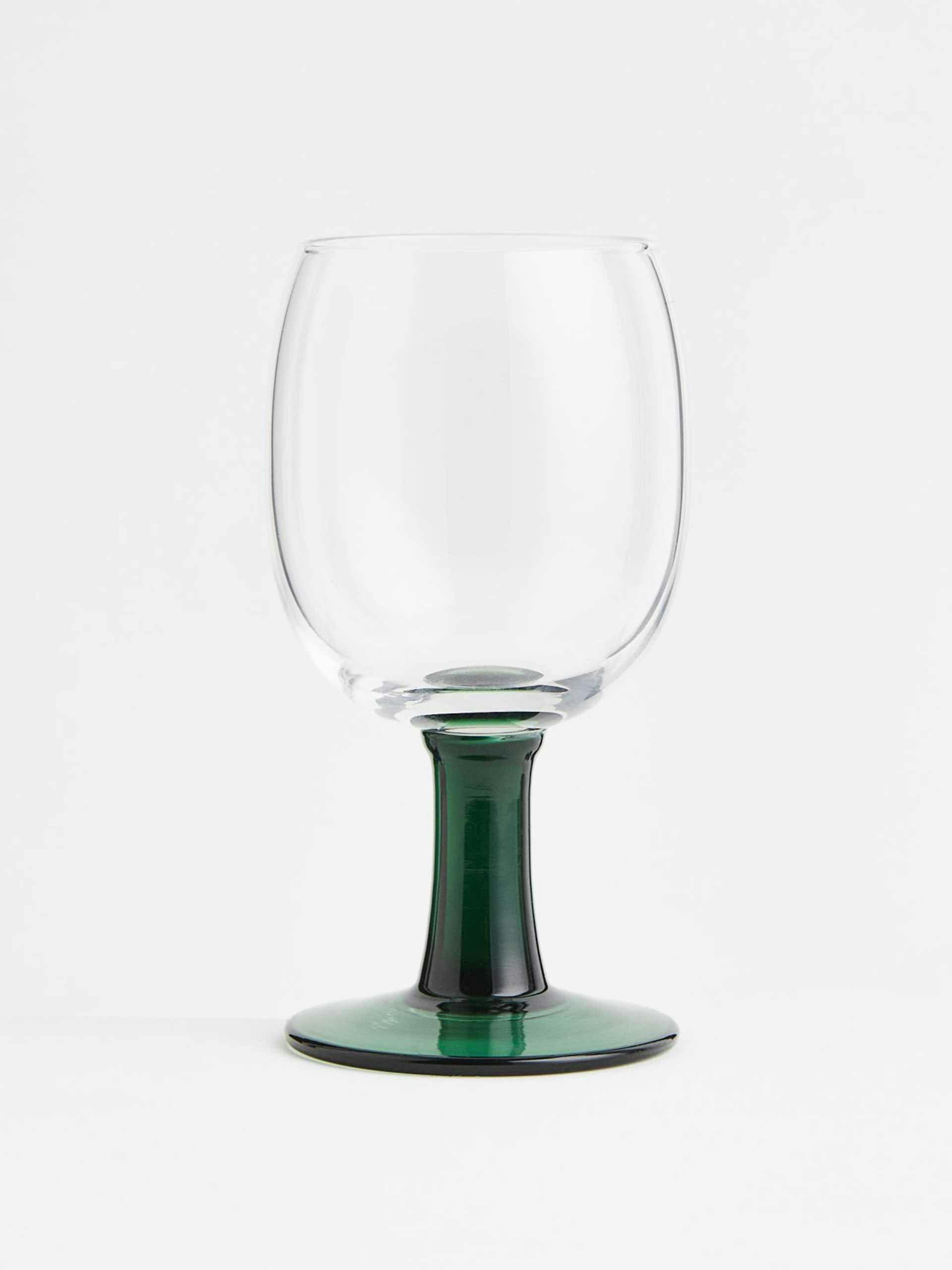 Clear and dark green wine glass