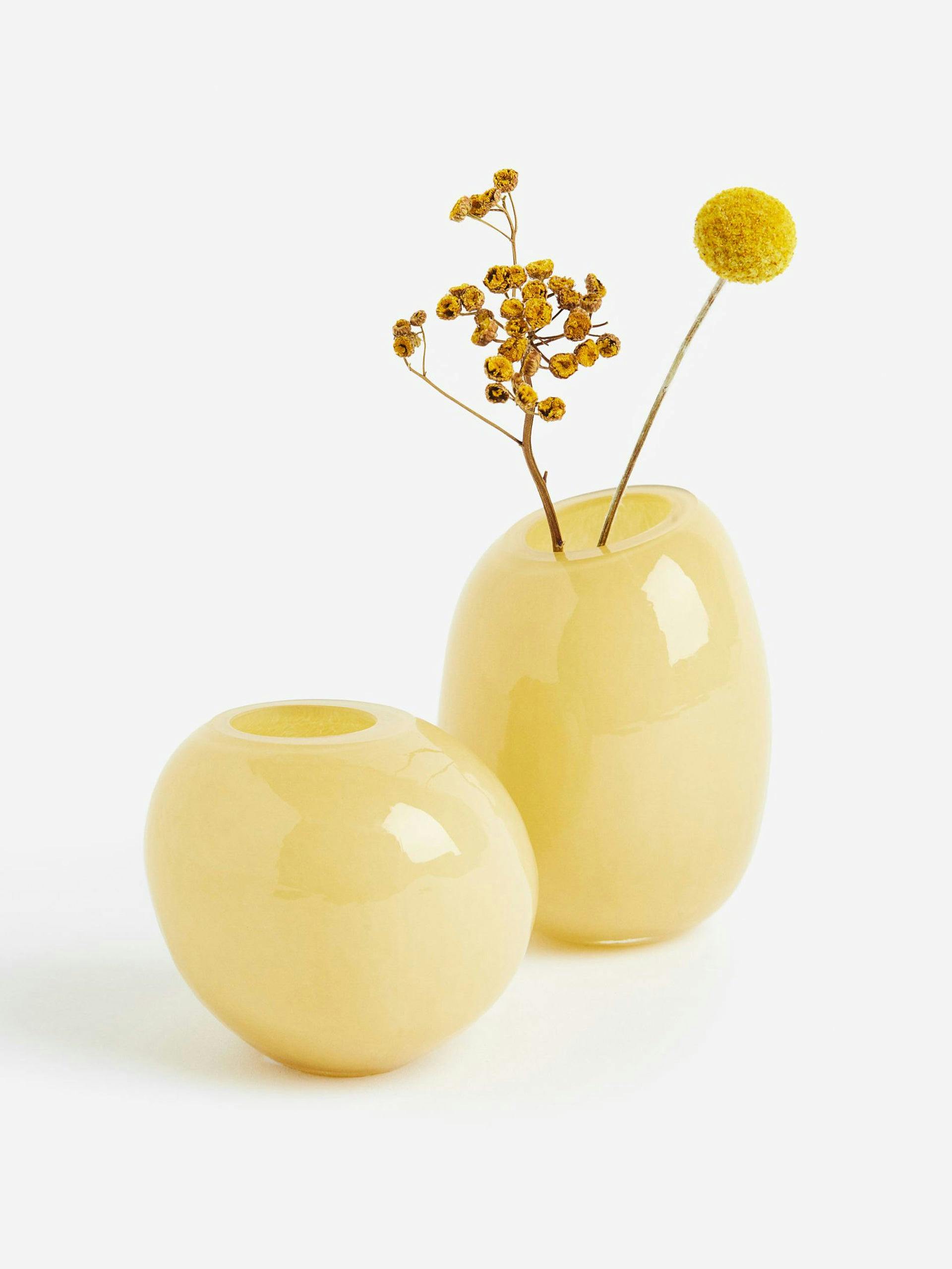 Small light yellow glass vase
