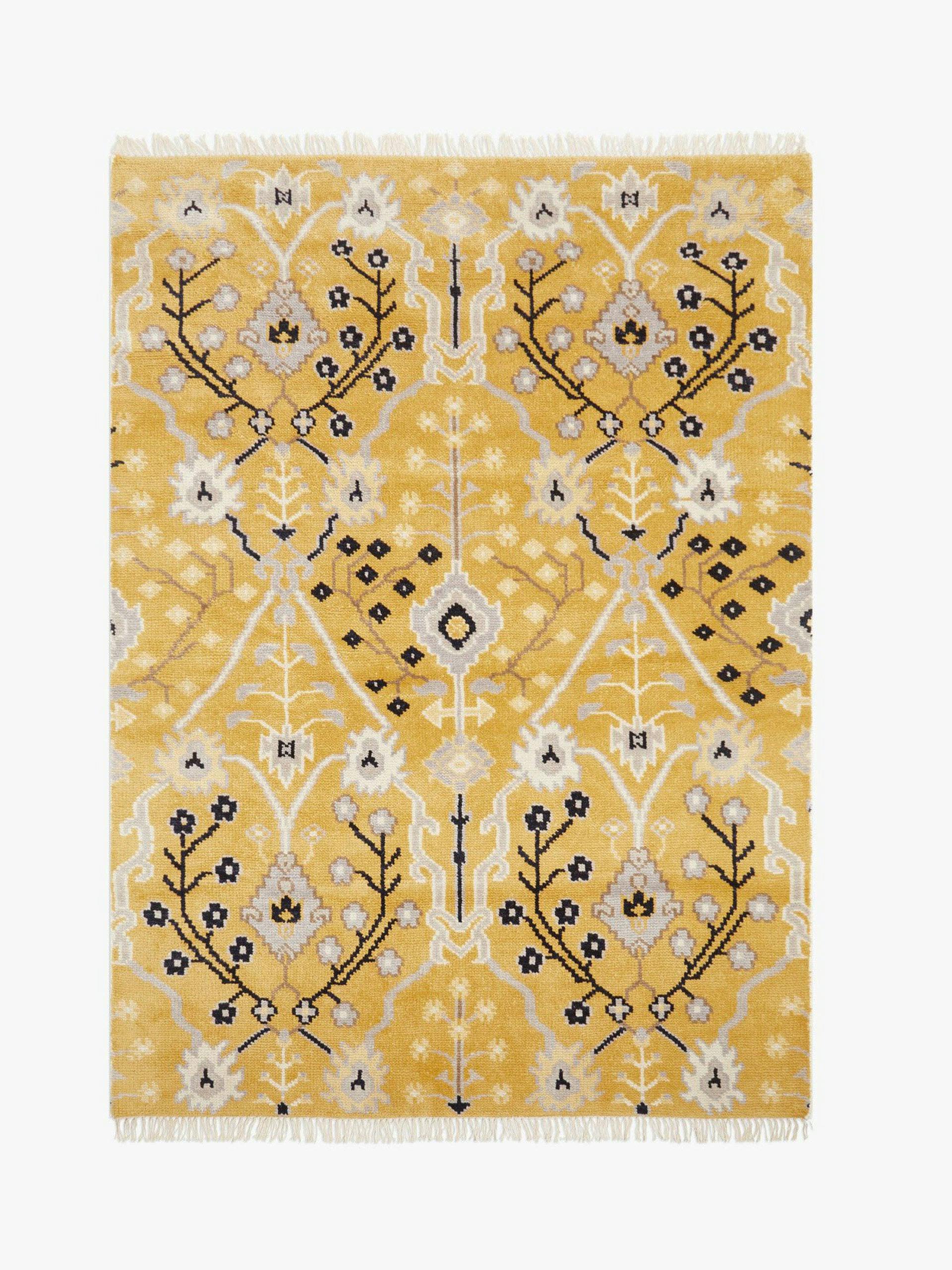 Geometric floral handwoven rug