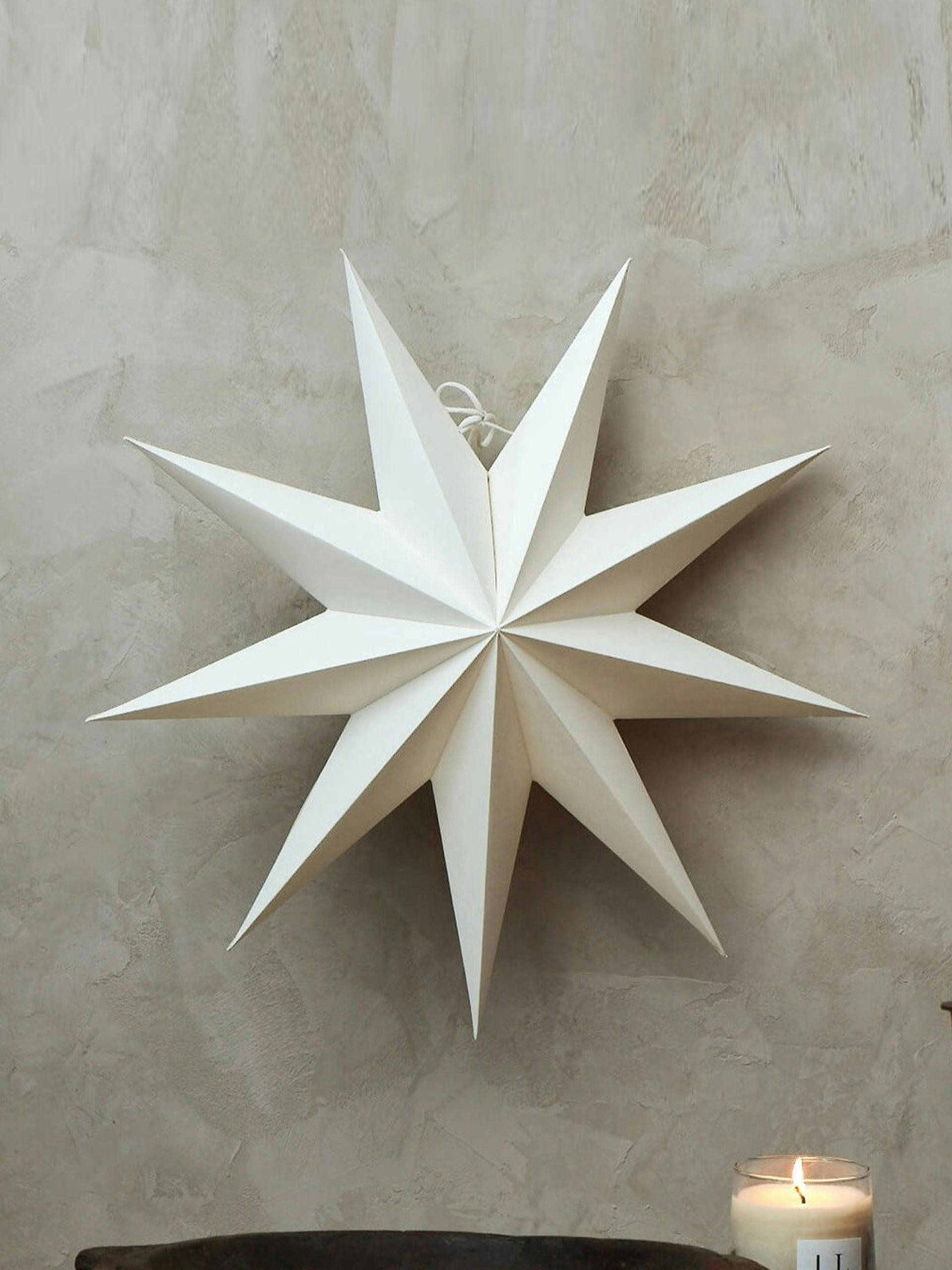 White foldable paper stars