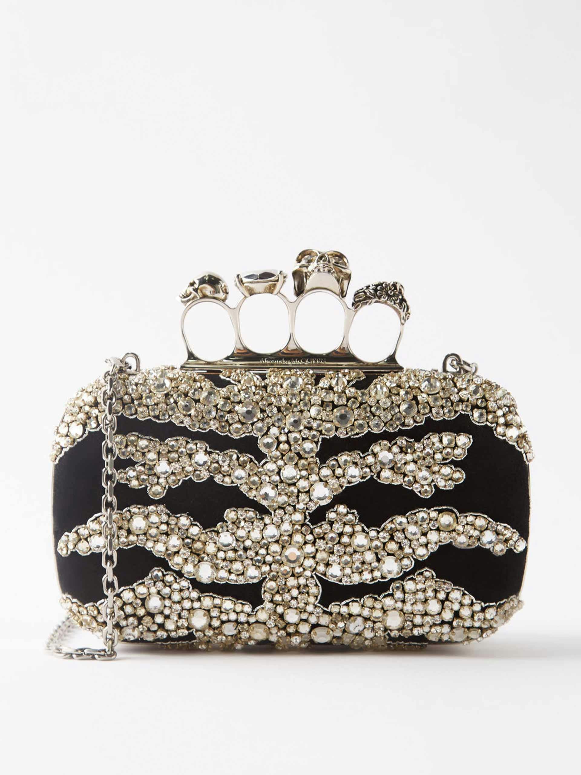 Four ring crystal-embellished satin clutch bag