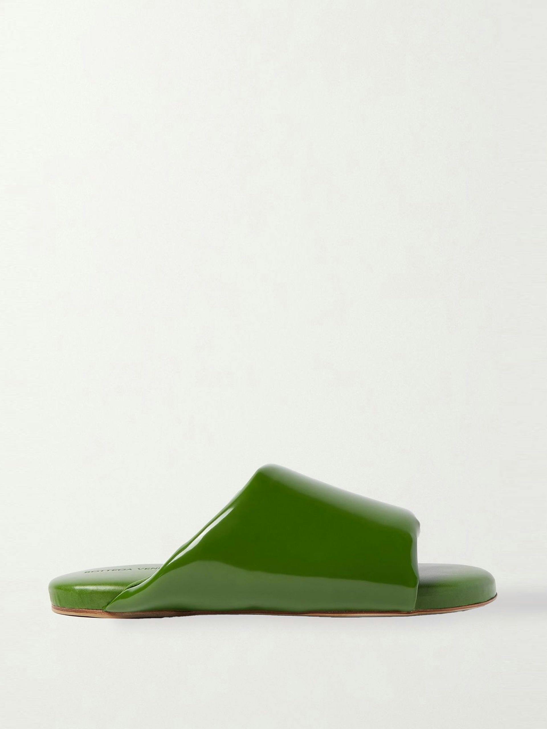 green glossed leather slides