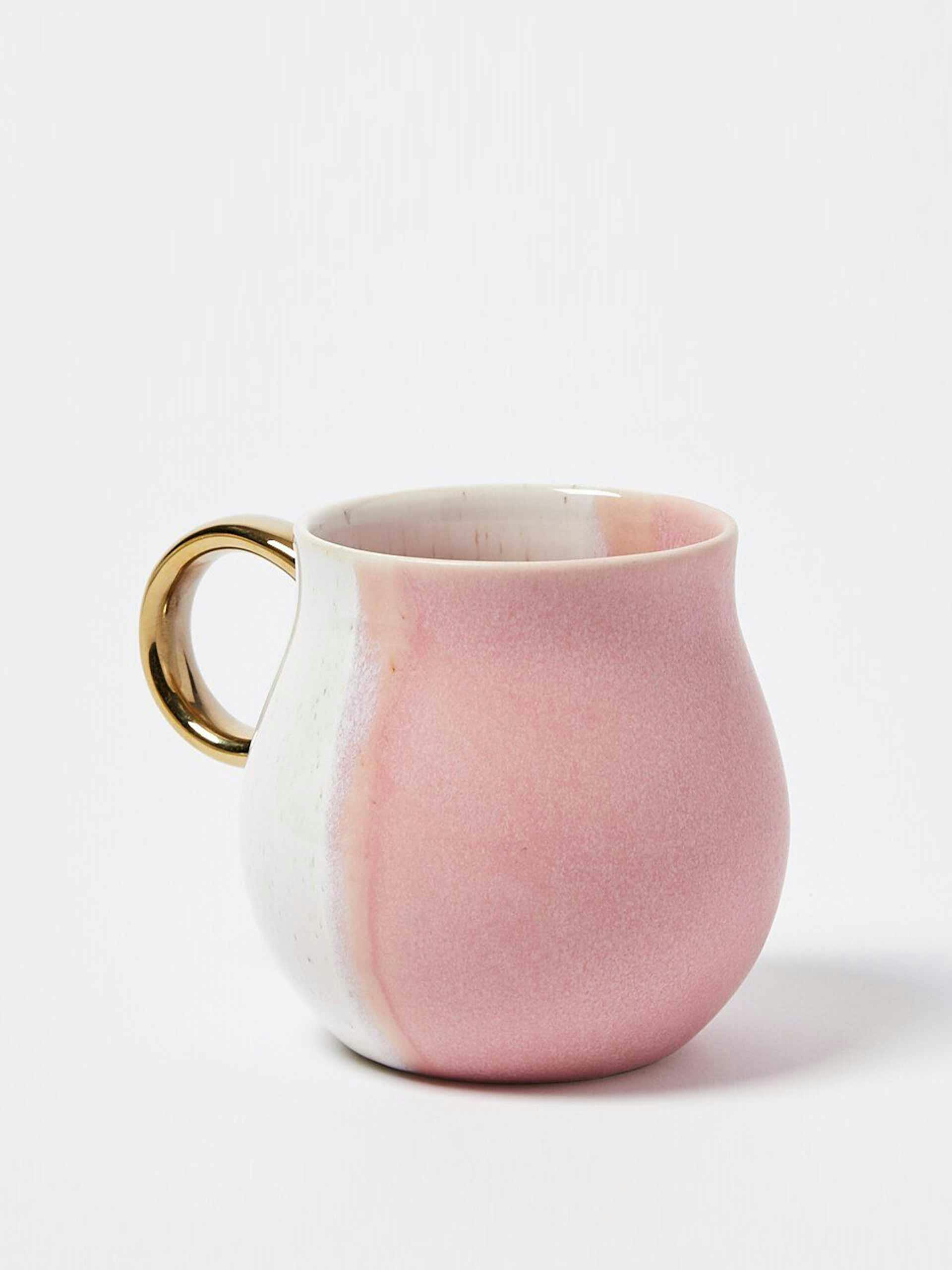 Pink glazed mug with gold handle