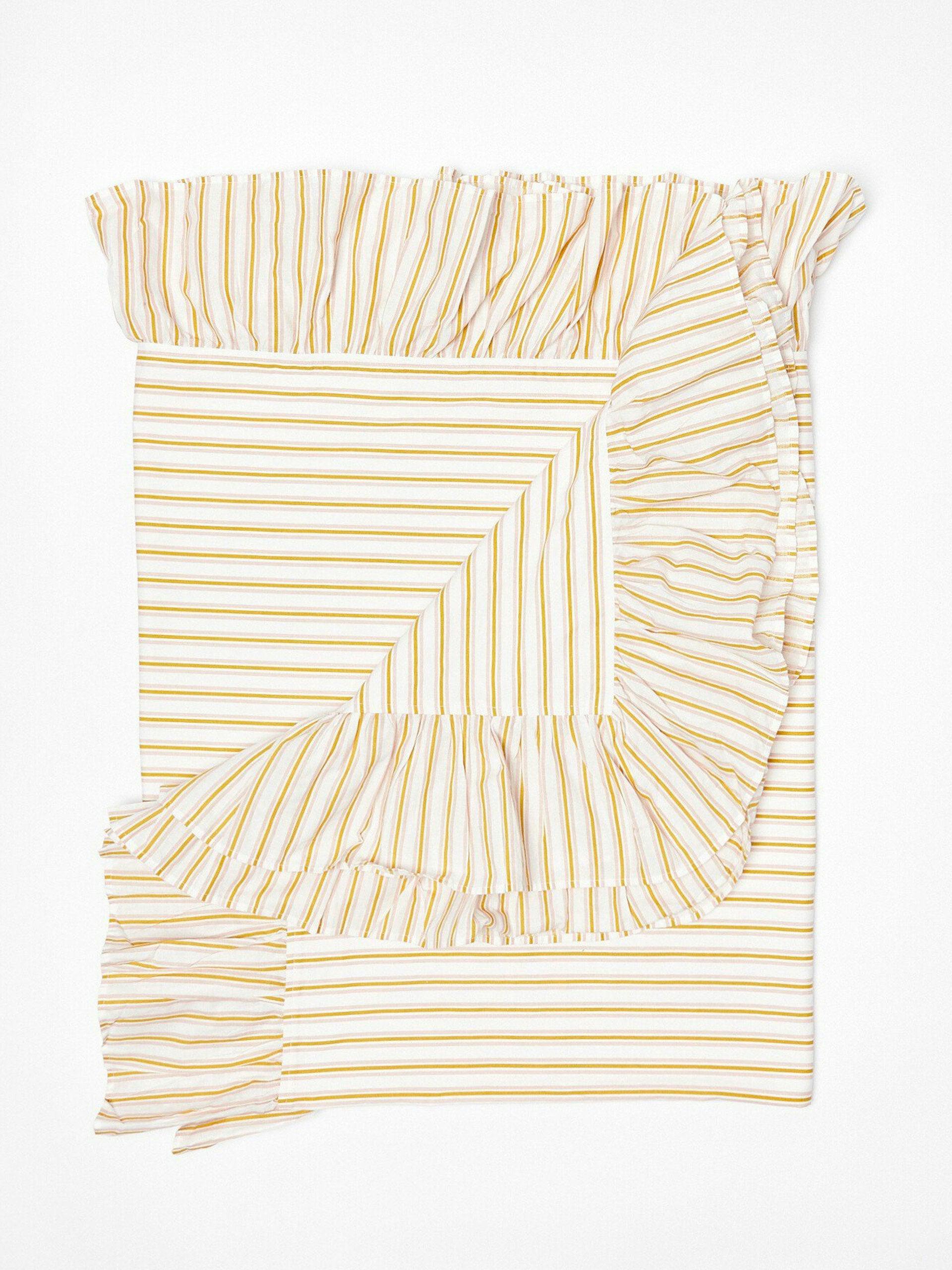 Yellow striped tablecloth
