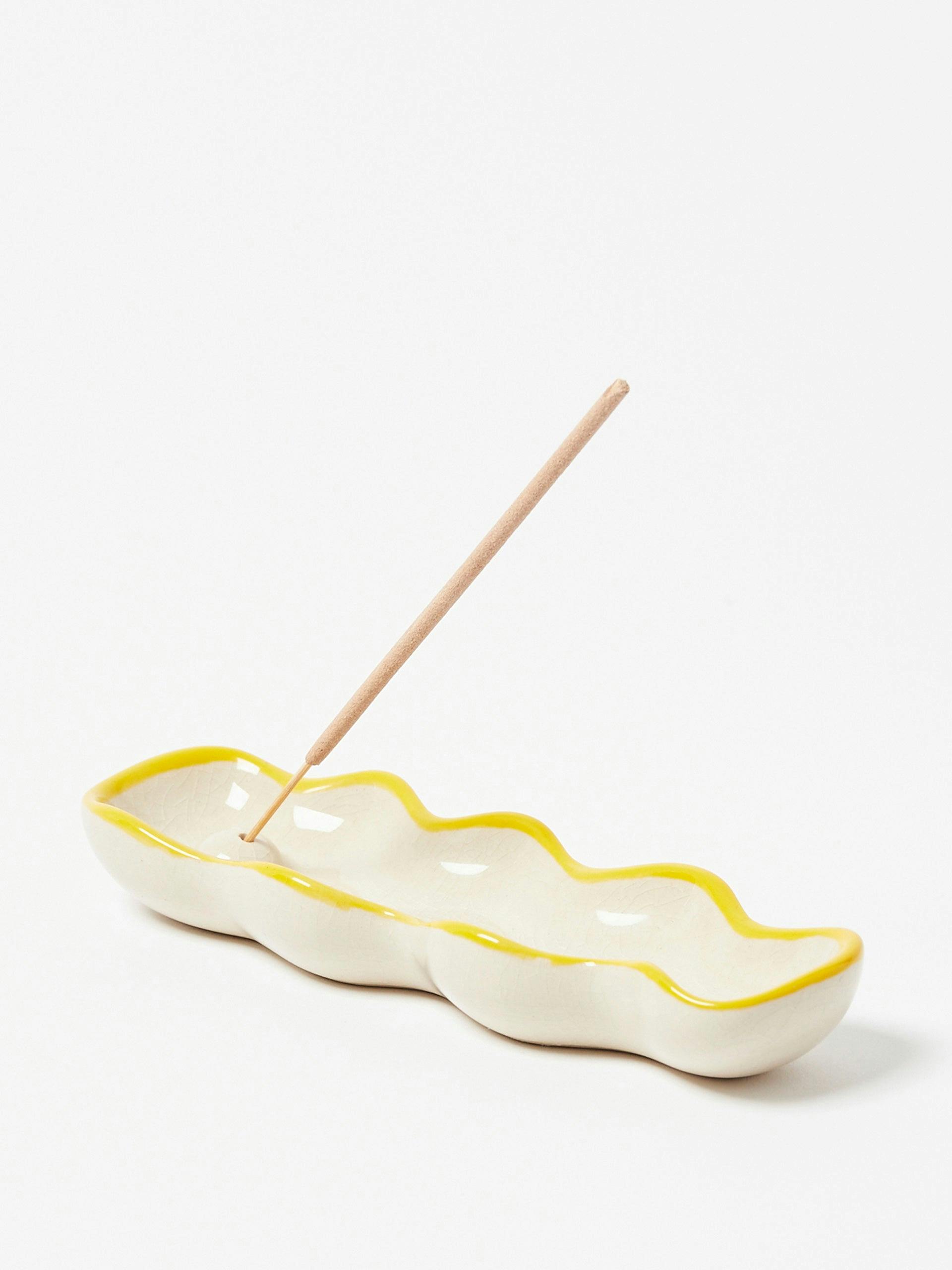 Wavy yellow edged ceramic incense holder