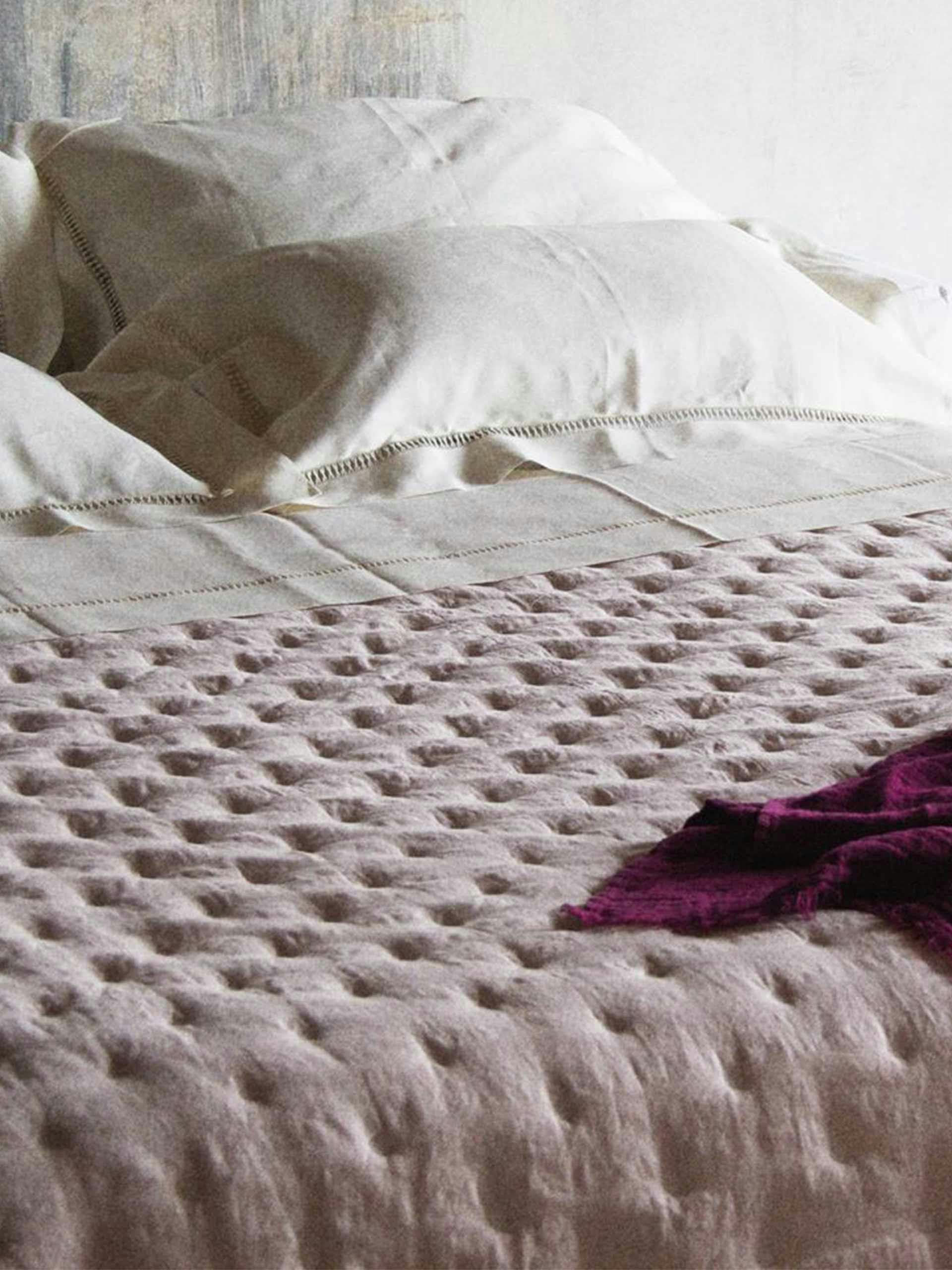 Handmade linen quilts in a variety of colours