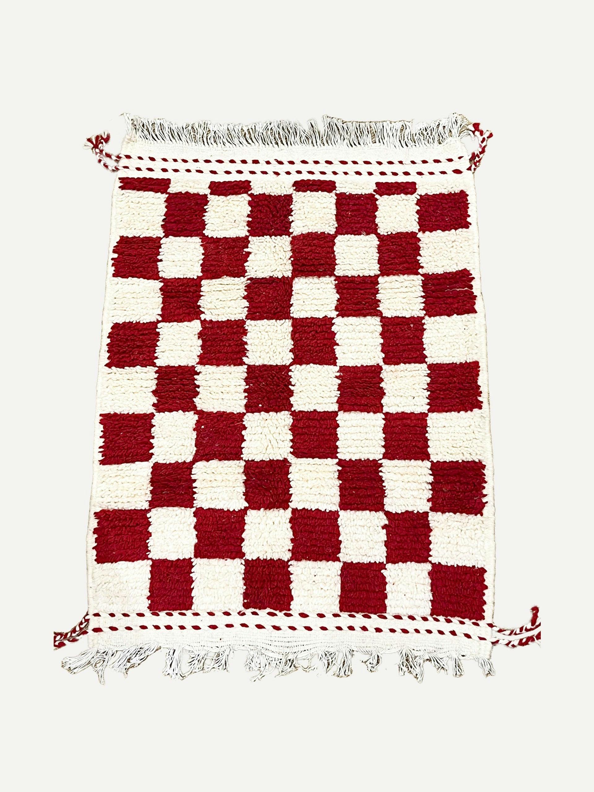 Red checkerboard berber rug