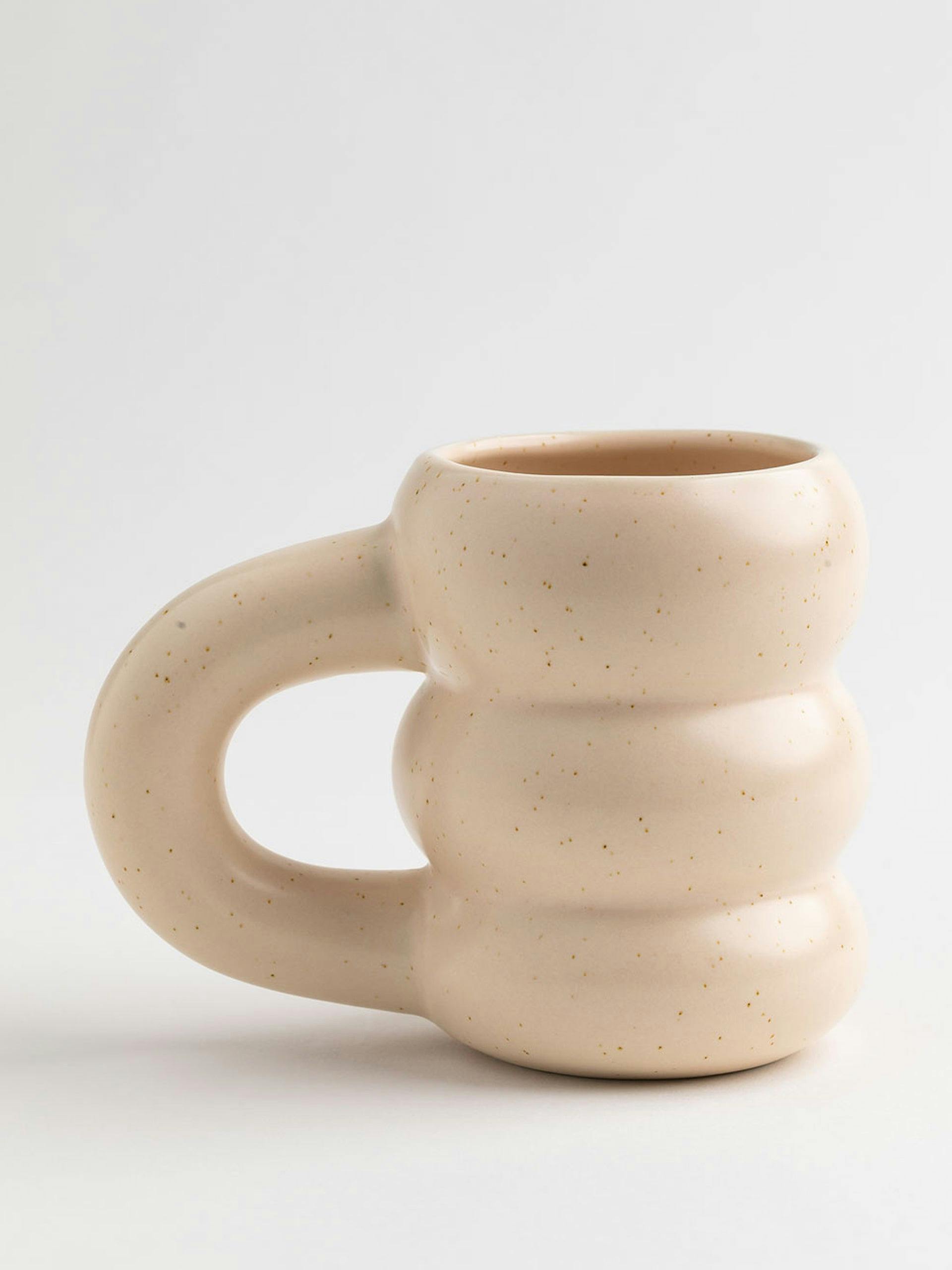 Ceramic coffee mug in beige vintage