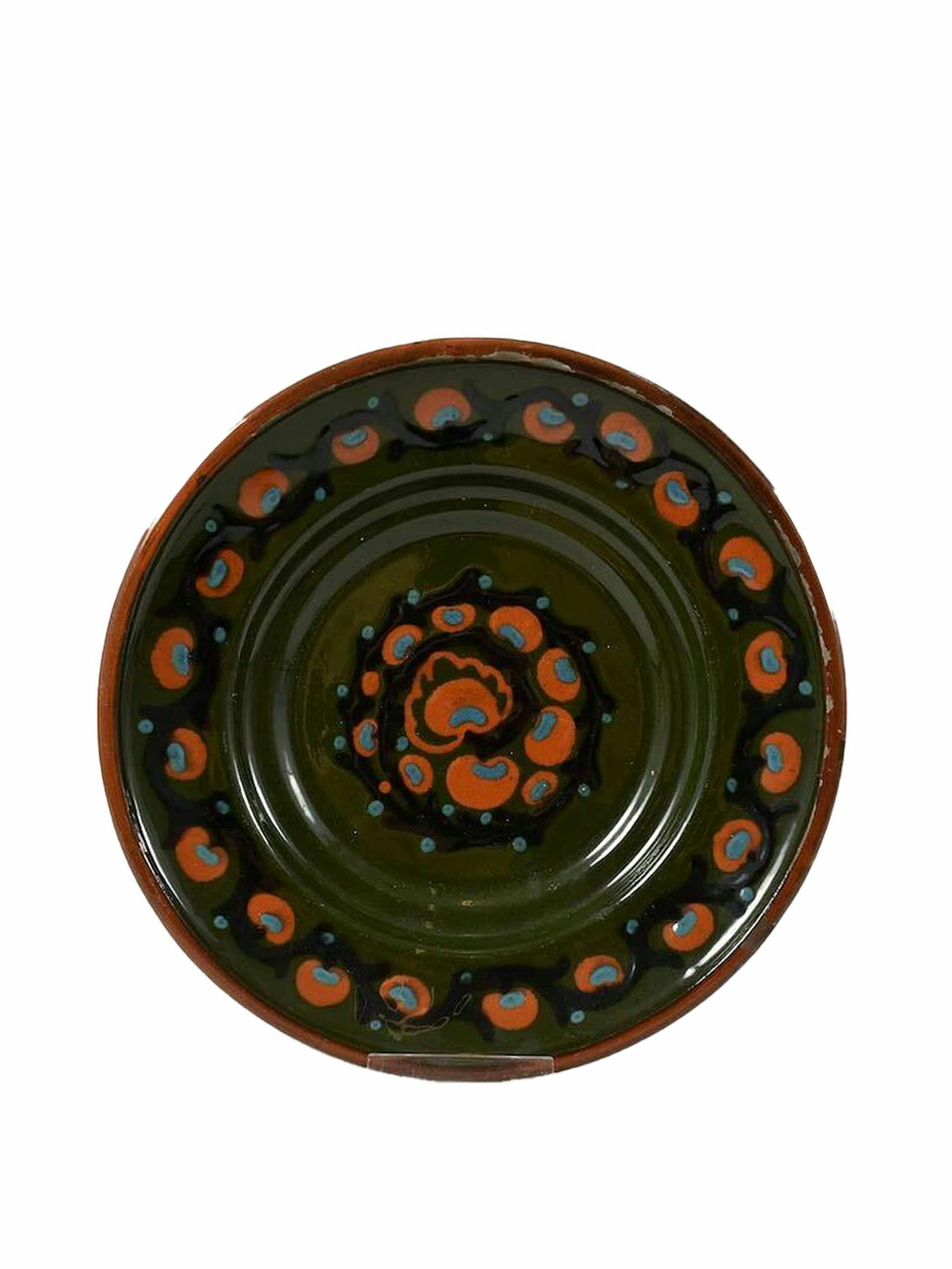 Dark green patterned plate