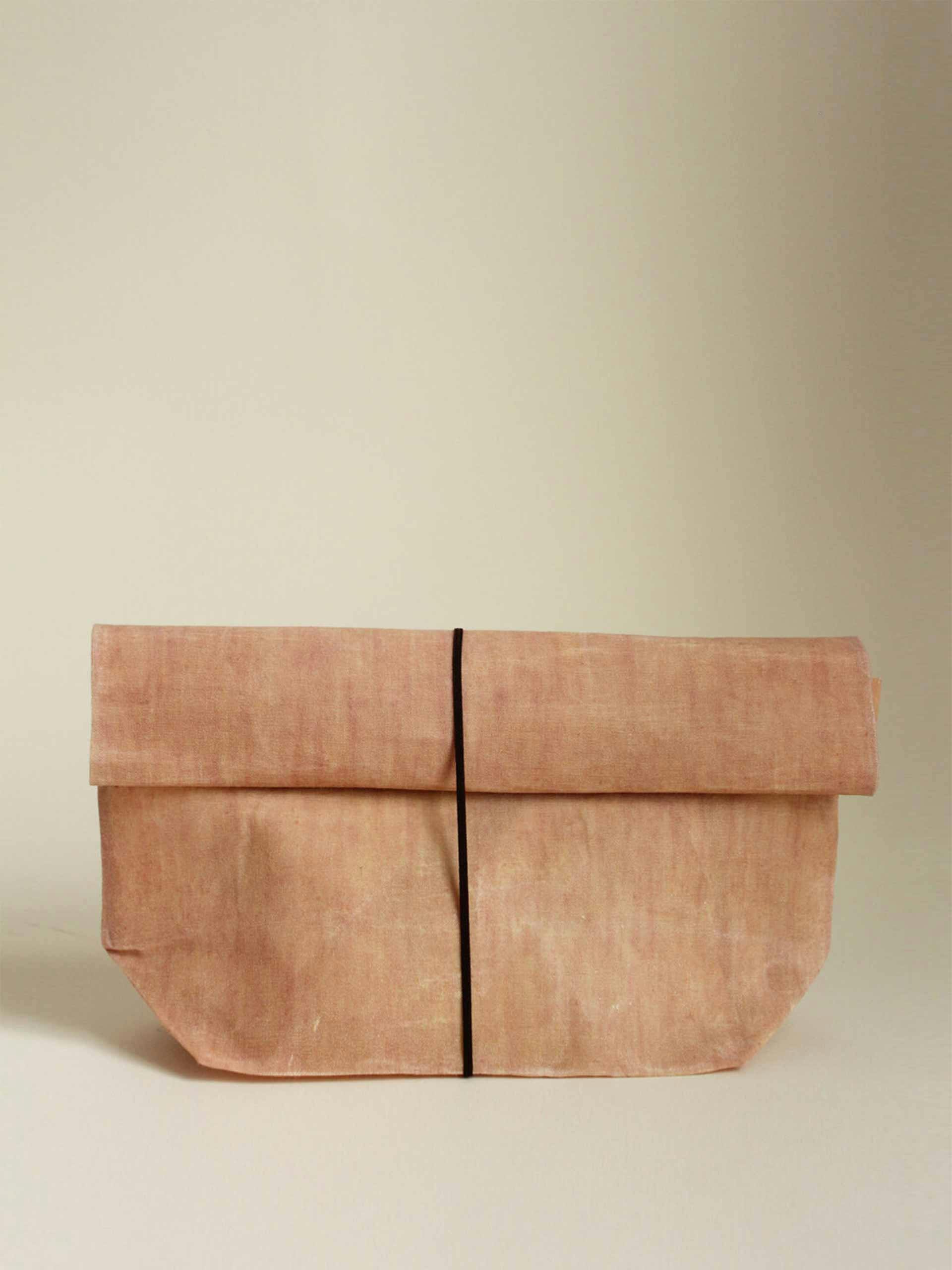 Light madder waxed linen roll-top bag