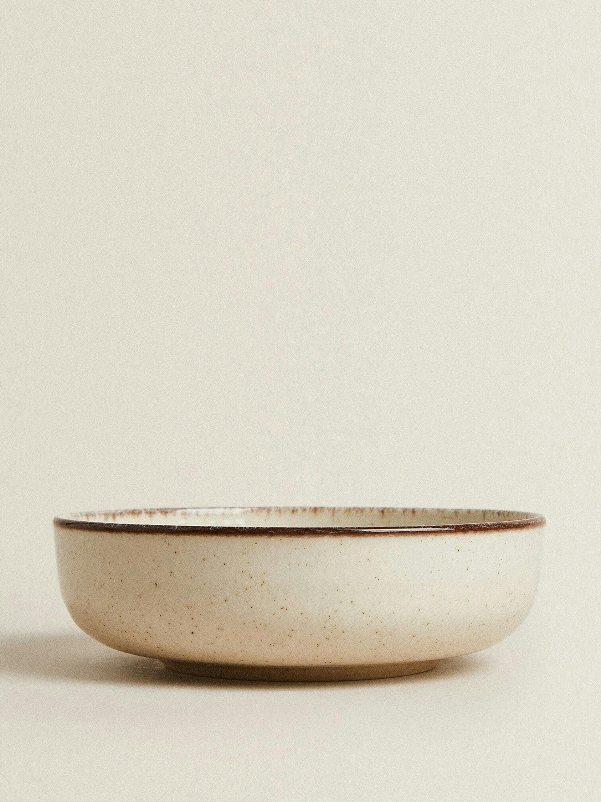 Porcelain soup plate with antique finish rim