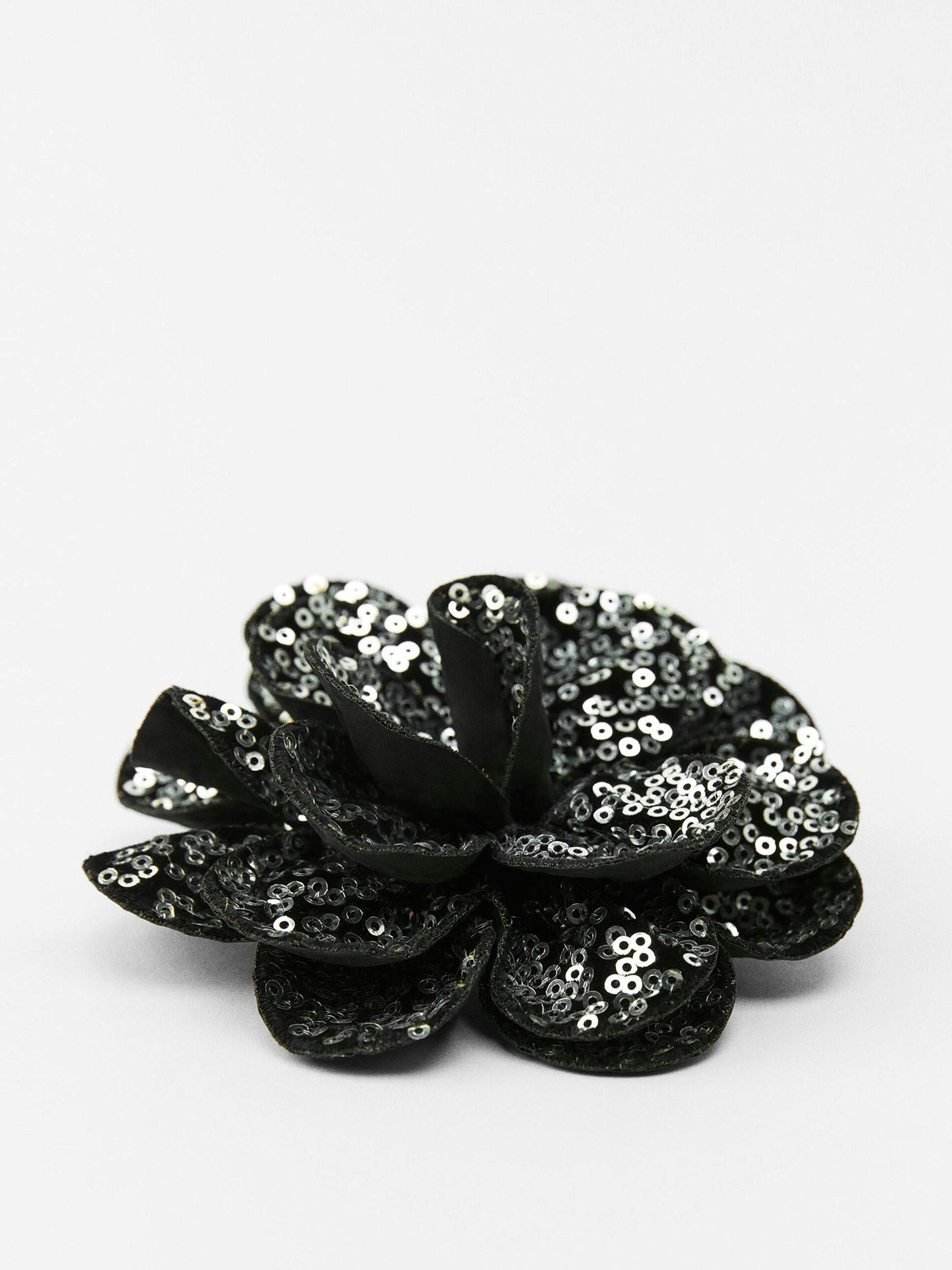 Brooch with silver sequins