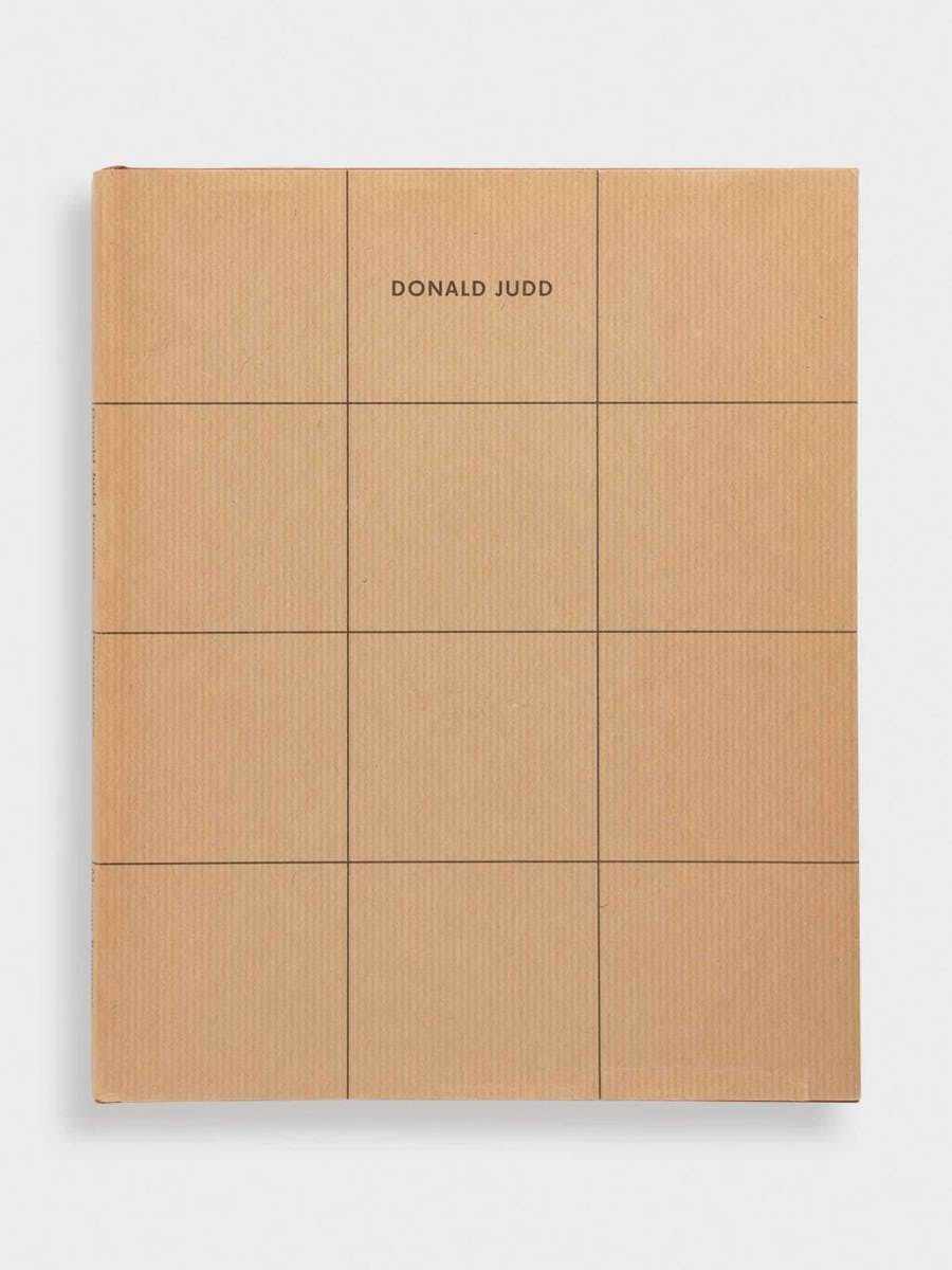 clean-slate-holding-donald-judd-catalogue