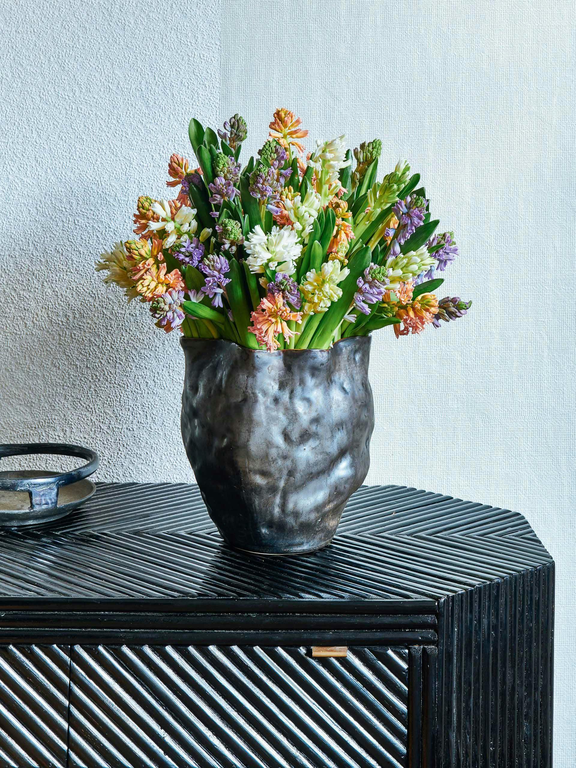 Hyacinth flower bouquet and vase