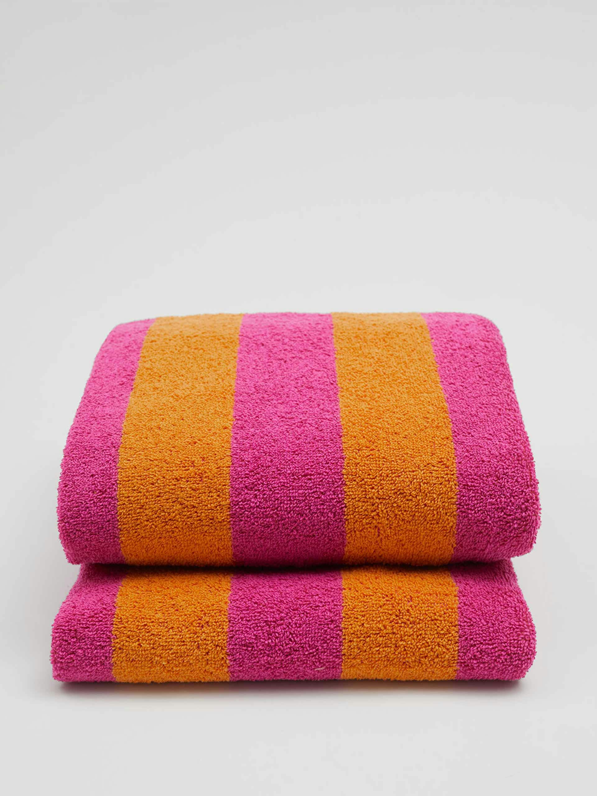 Pink and orange stripe beach towel