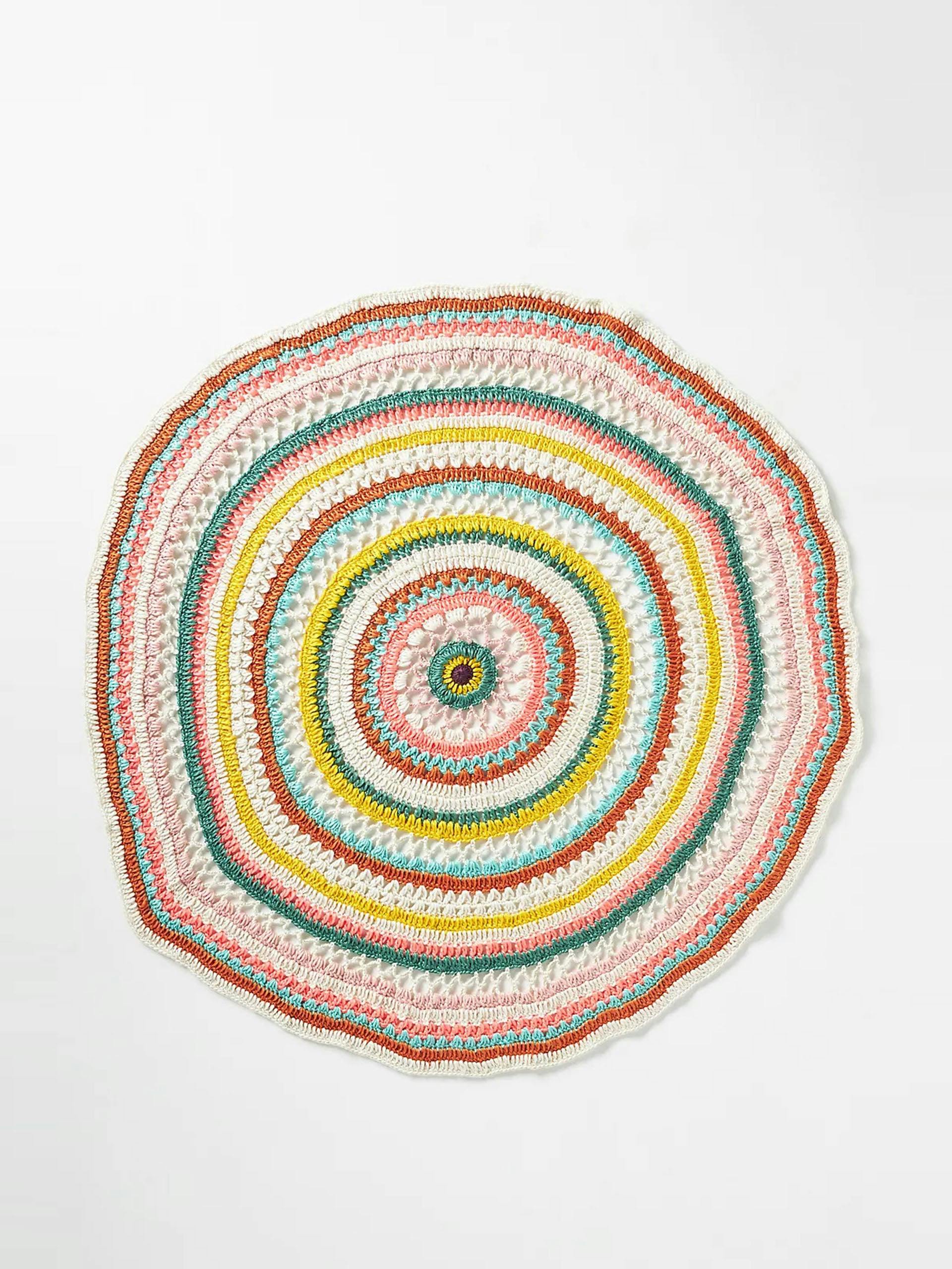 Multicoloured hand-crocheted throw blanket