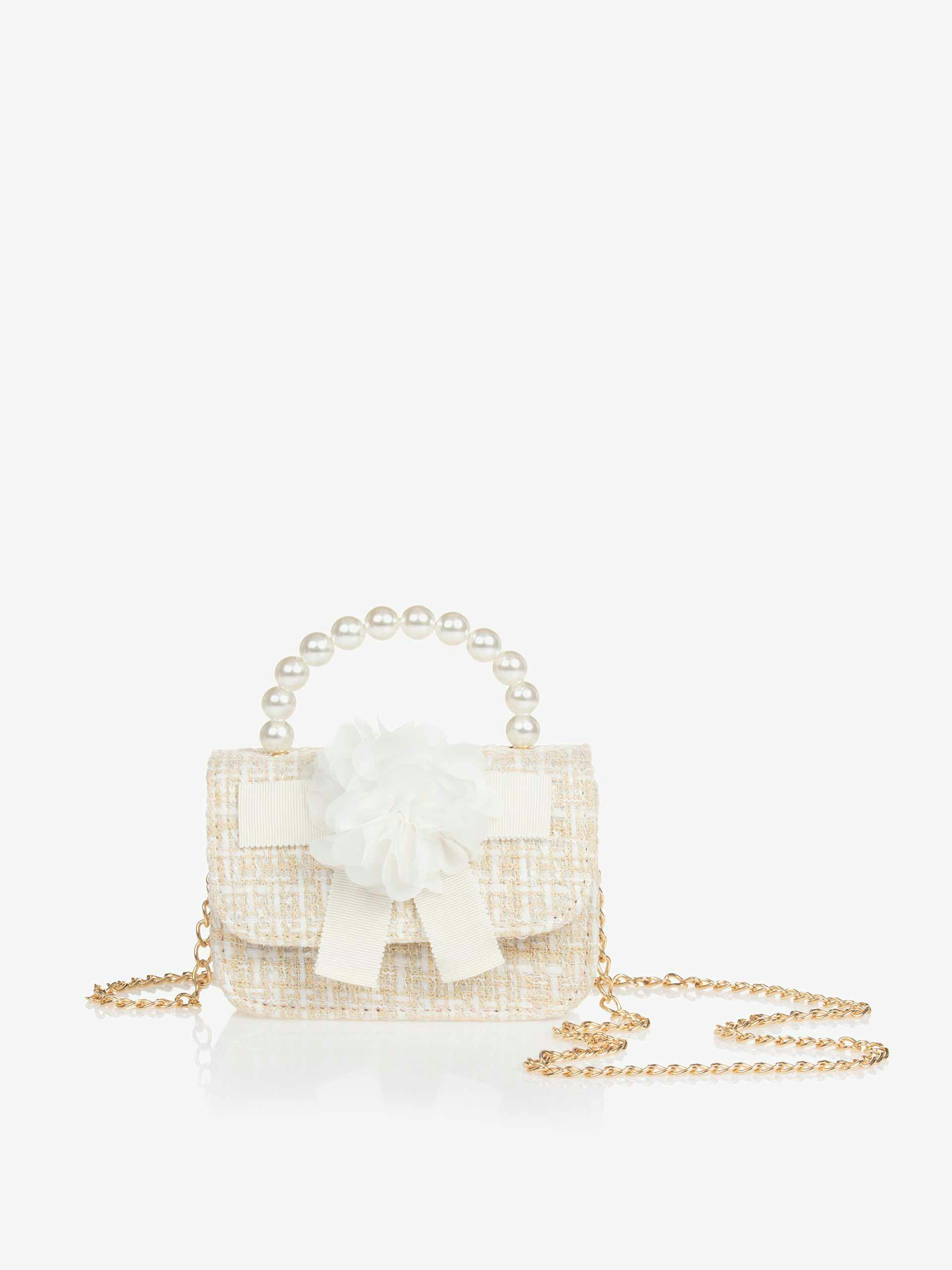 Girl’s beige tweed handbag
