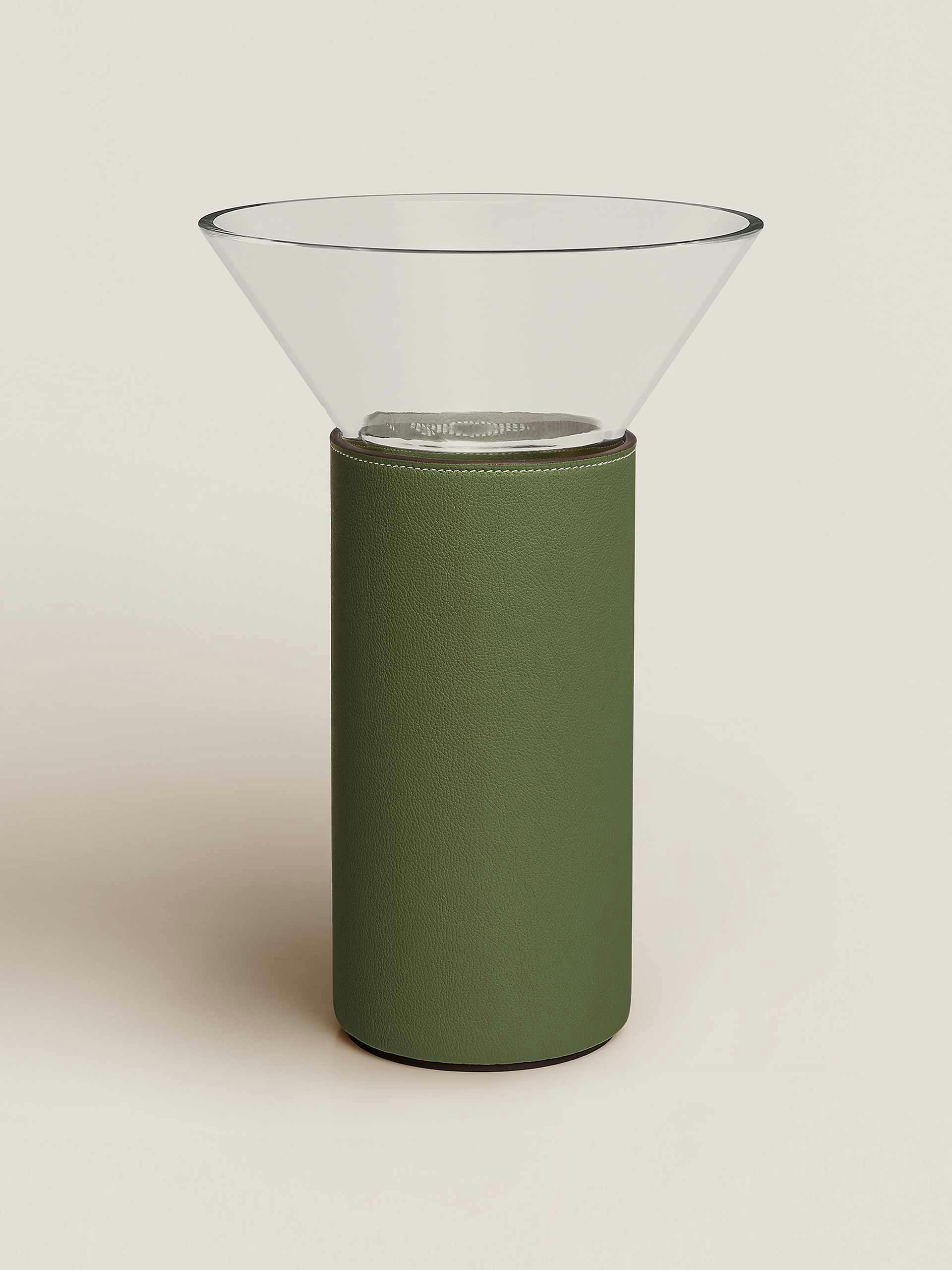 Glass vase with green leather base