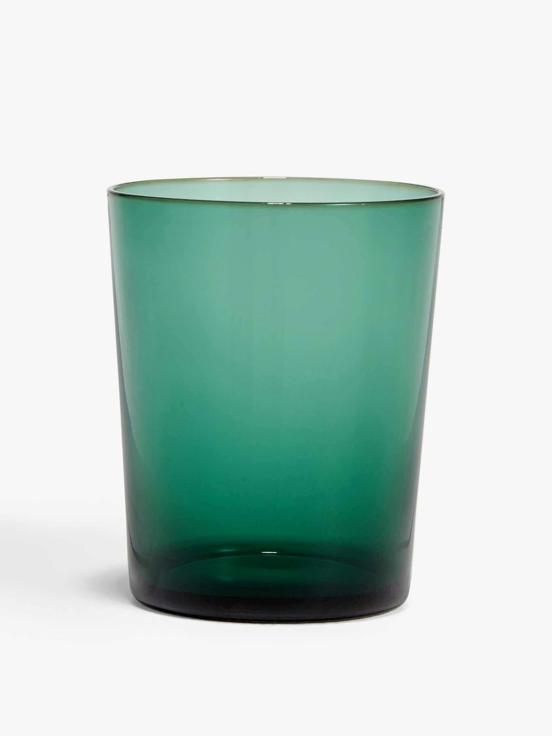 Glass tumbler with green rim