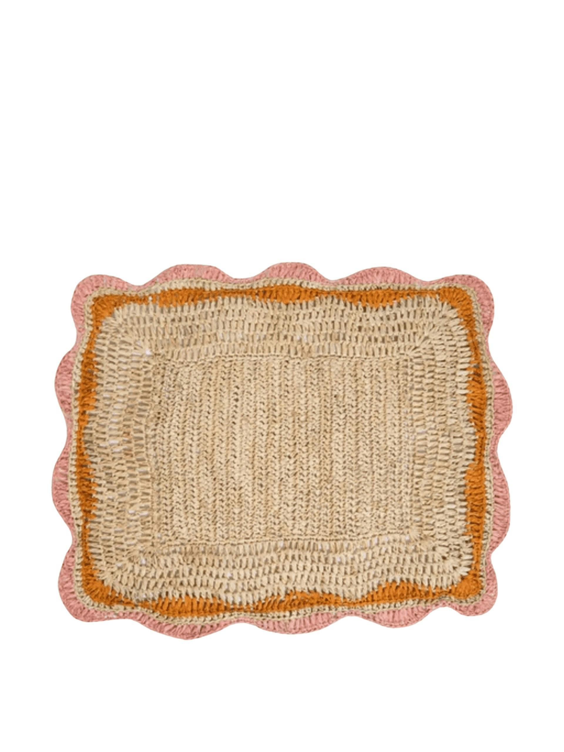 Garden party placemat with pink and orange edges