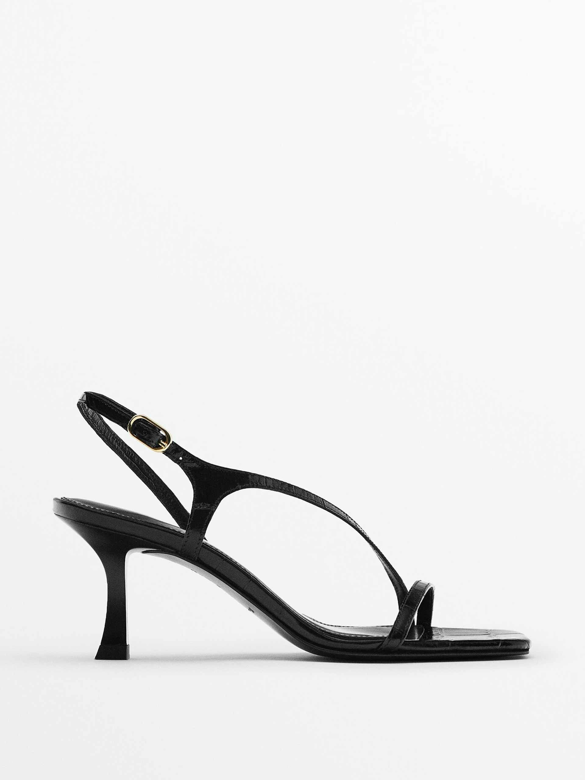Black high-heel leather sandals with criss cross strap
