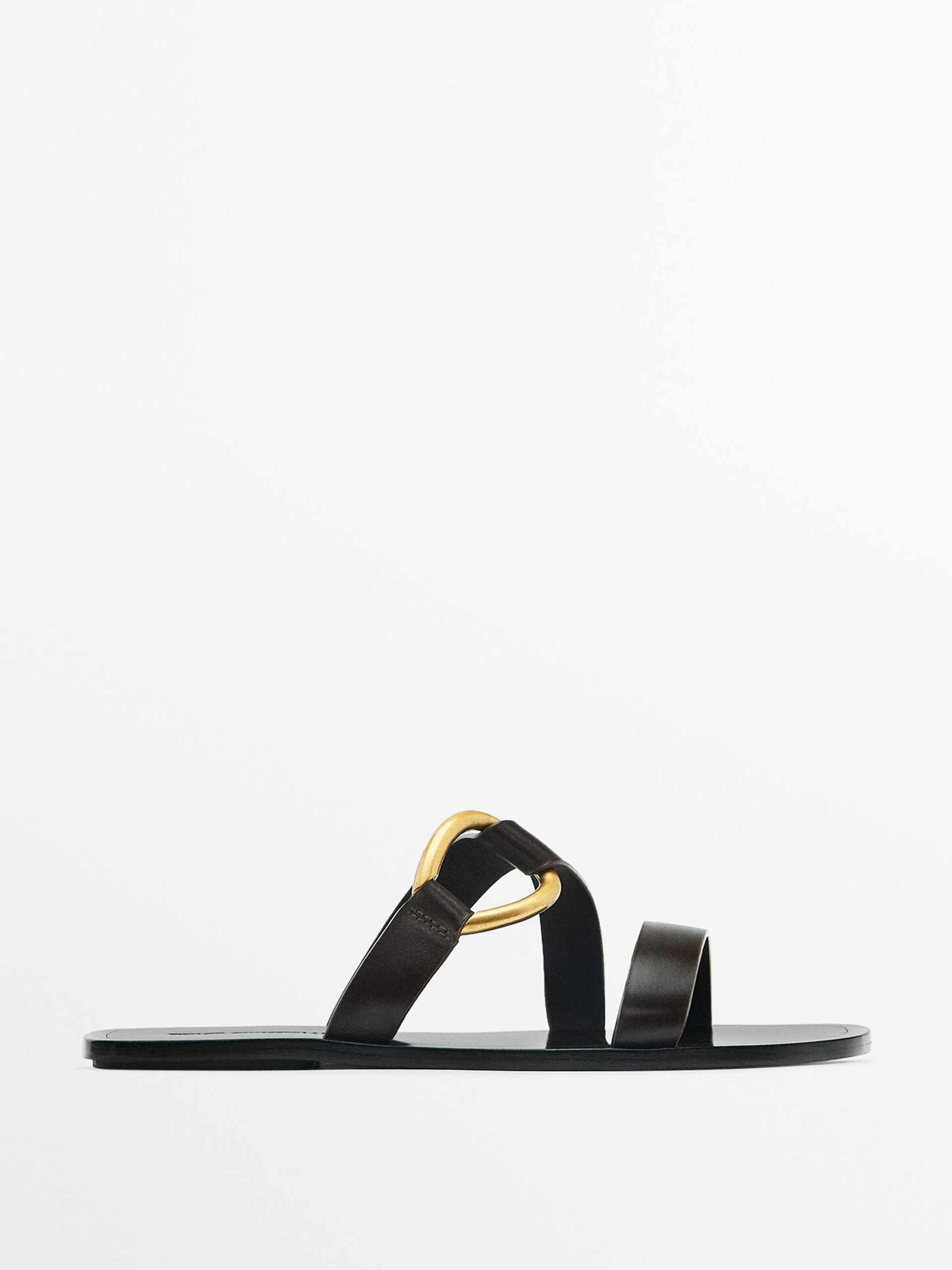 Black flat slider sandals with metal ring detail